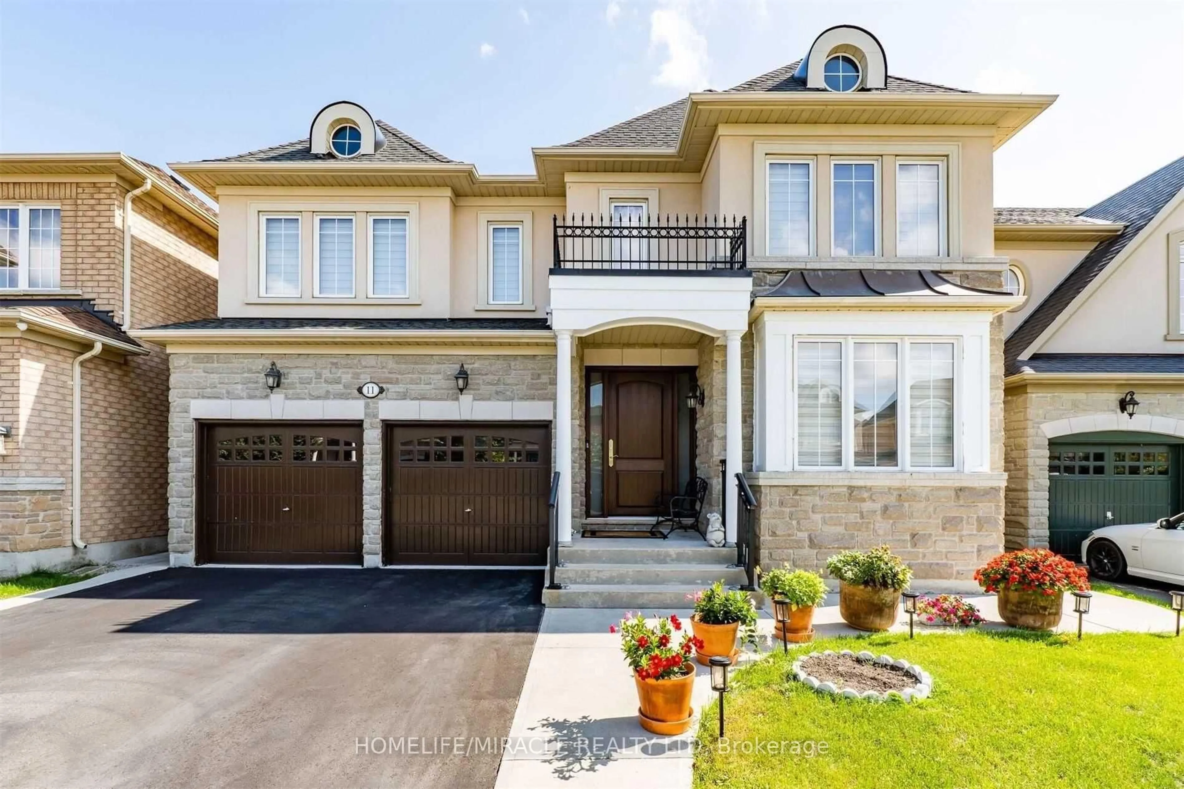 Home with brick exterior material, street for 11 Condorvalley Cres, Brampton Ontario L6P 2T7