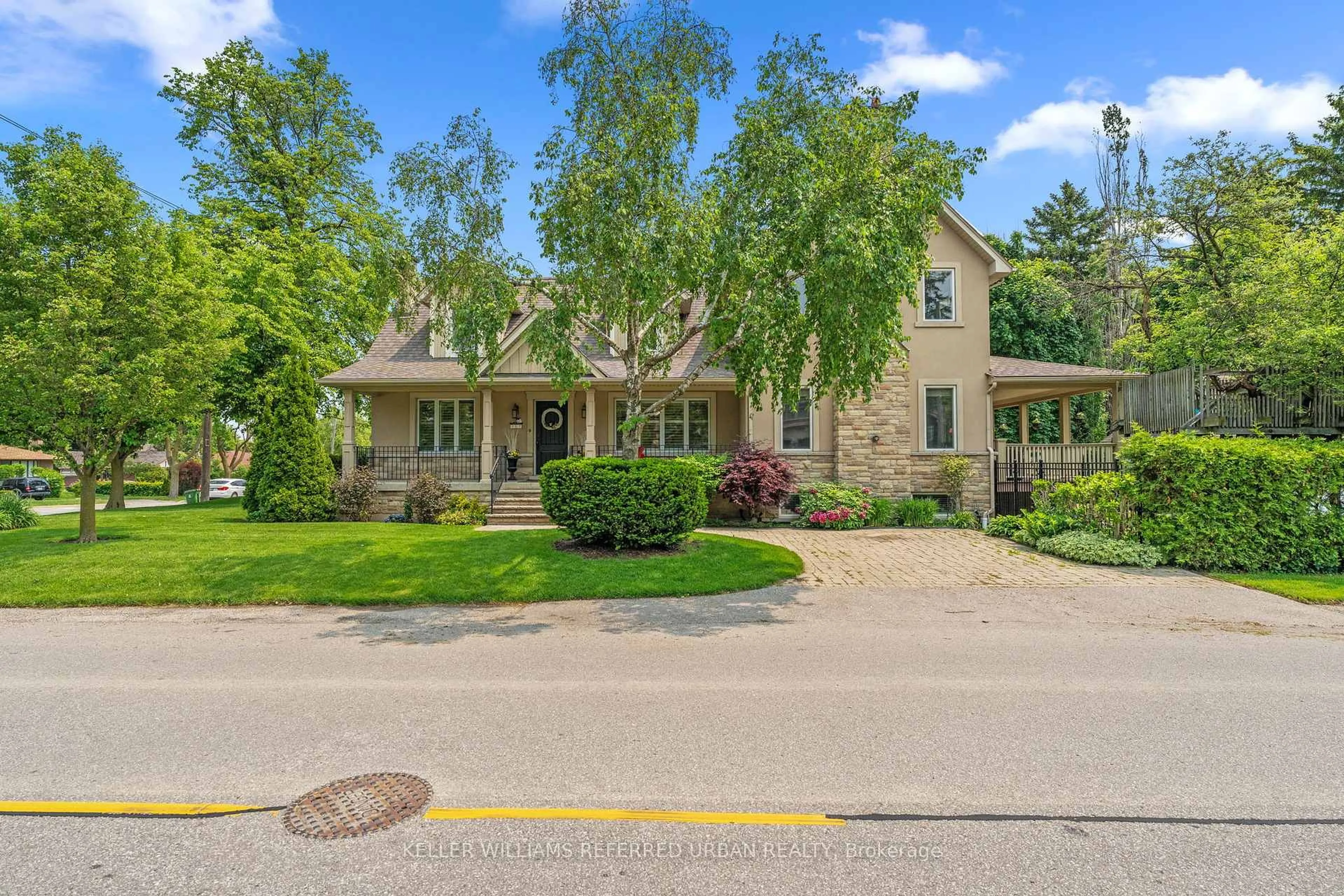 A pic from outside/outdoor area/front of a property/back of a property/a pic from drone, street for 317 Rathburn Rd, Toronto Ontario M9B 2L7