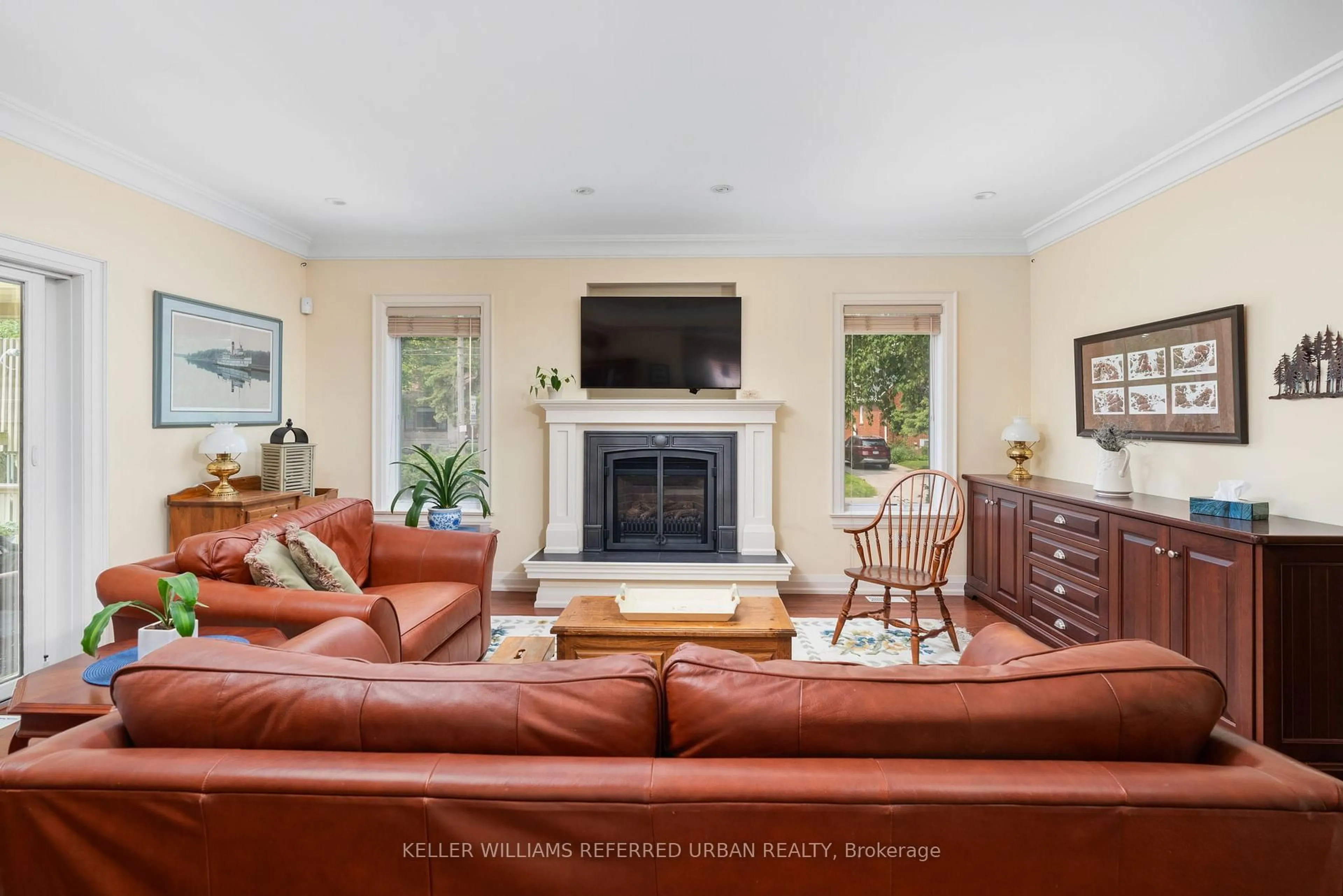 Living room with furniture, ceramic/tile floor for 317 Rathburn Rd, Toronto Ontario M9B 2L7