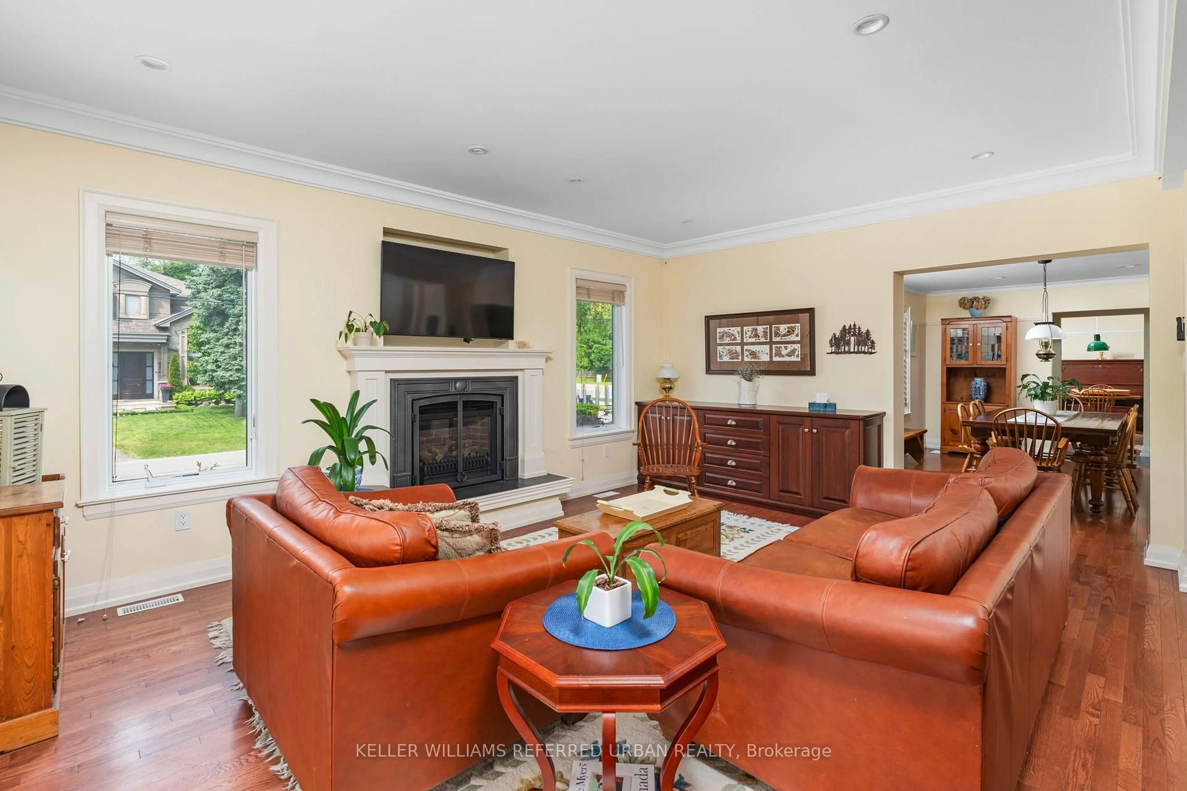 Living room with furniture, ceramic/tile floor for 317 Rathburn Rd, Toronto Ontario M9B 2L7