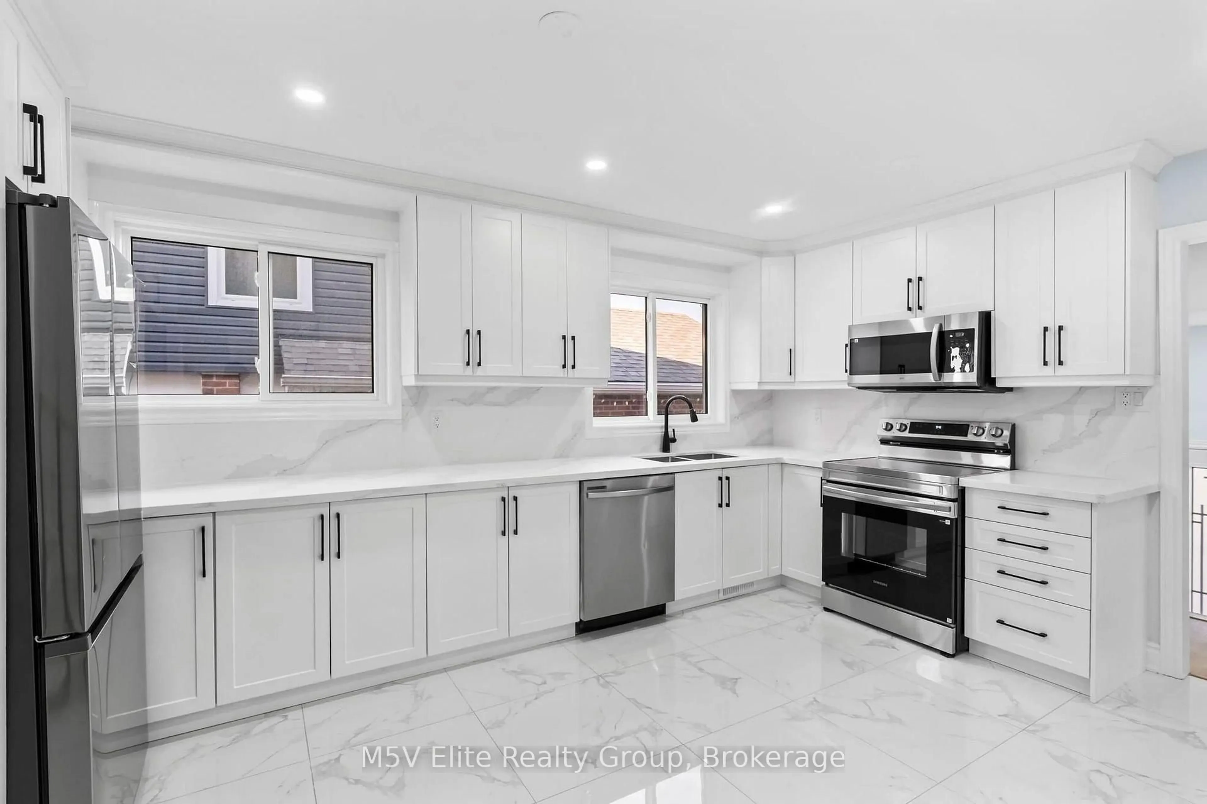 Open concept kitchen, ceramic/tile floor for 93 Ashford Crt, Brampton Ontario L6V 3E2