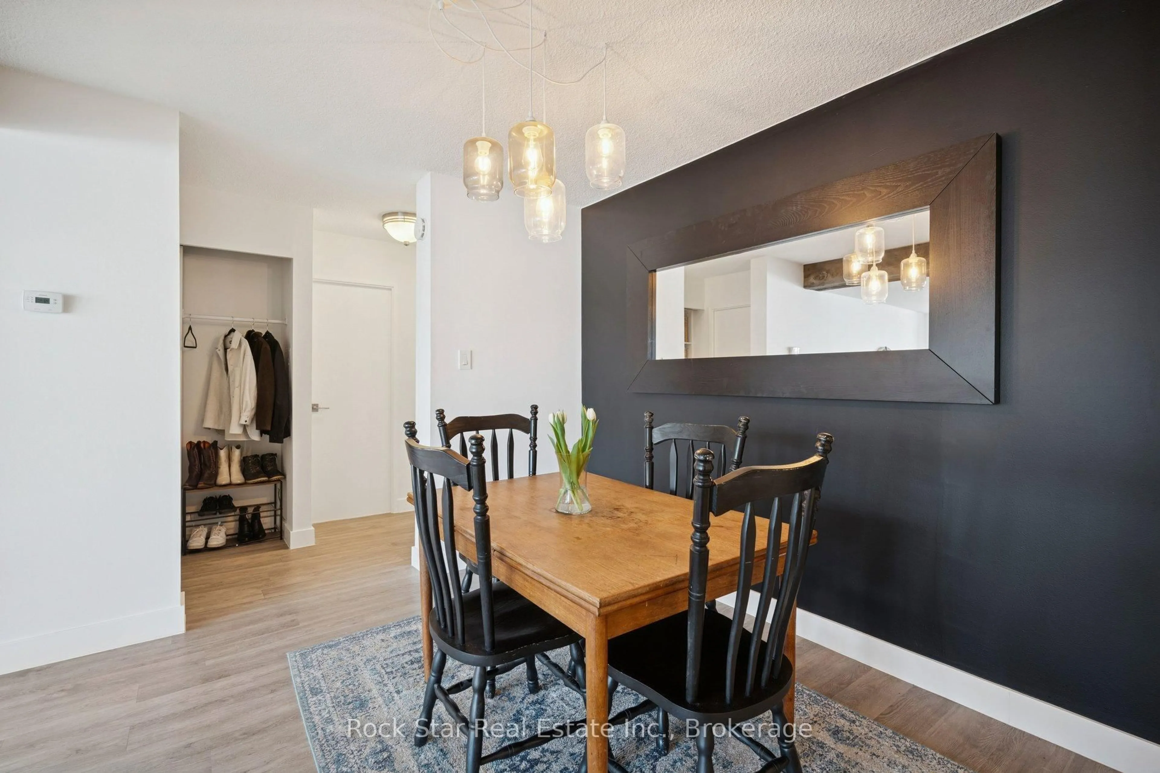 Dining room, wood/laminate floor for 20 Speers Rd #103, Oakville Ontario L6K 3R5