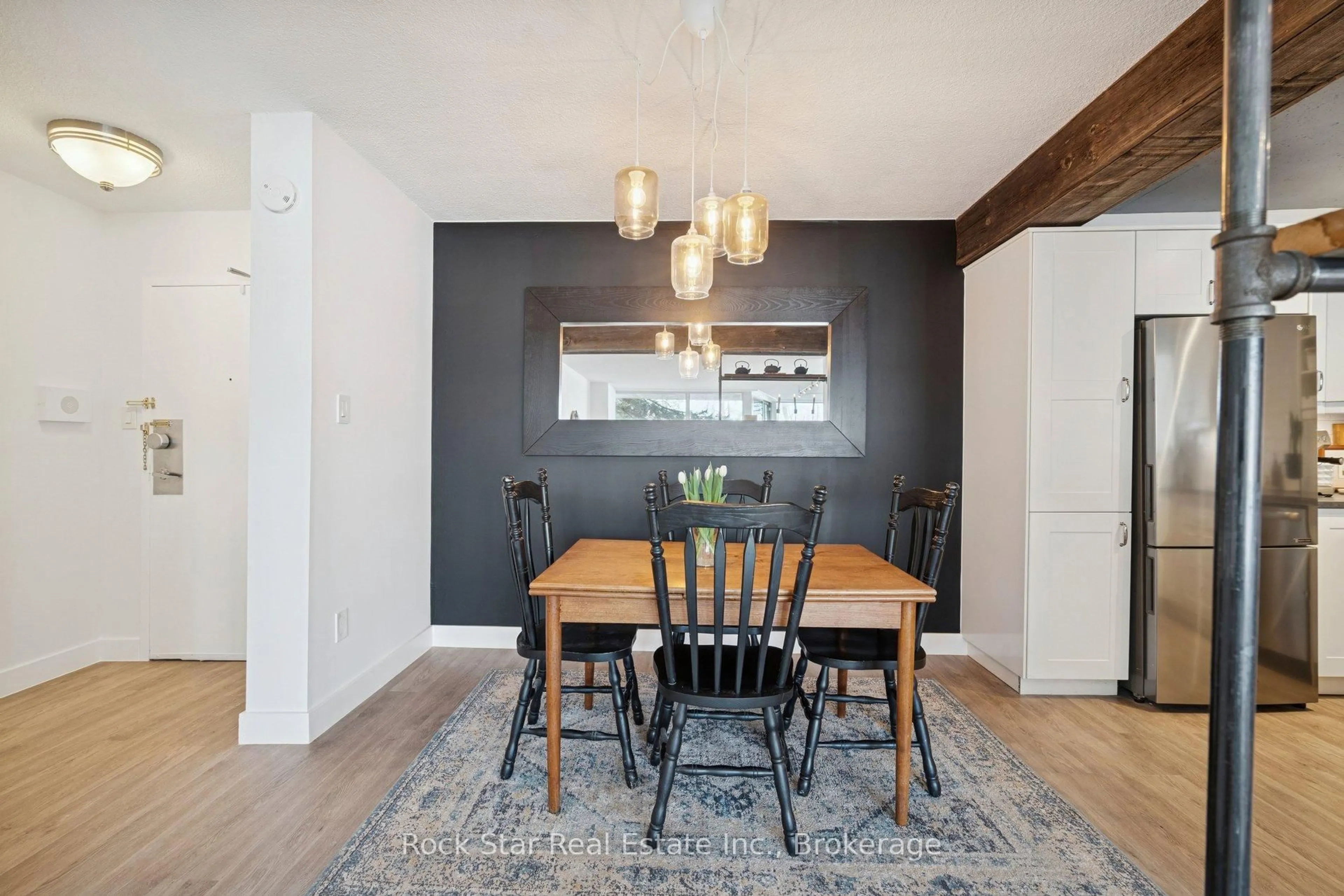 Dining room, wood/laminate floor for 20 Speers Rd #103, Oakville Ontario L6K 3R5