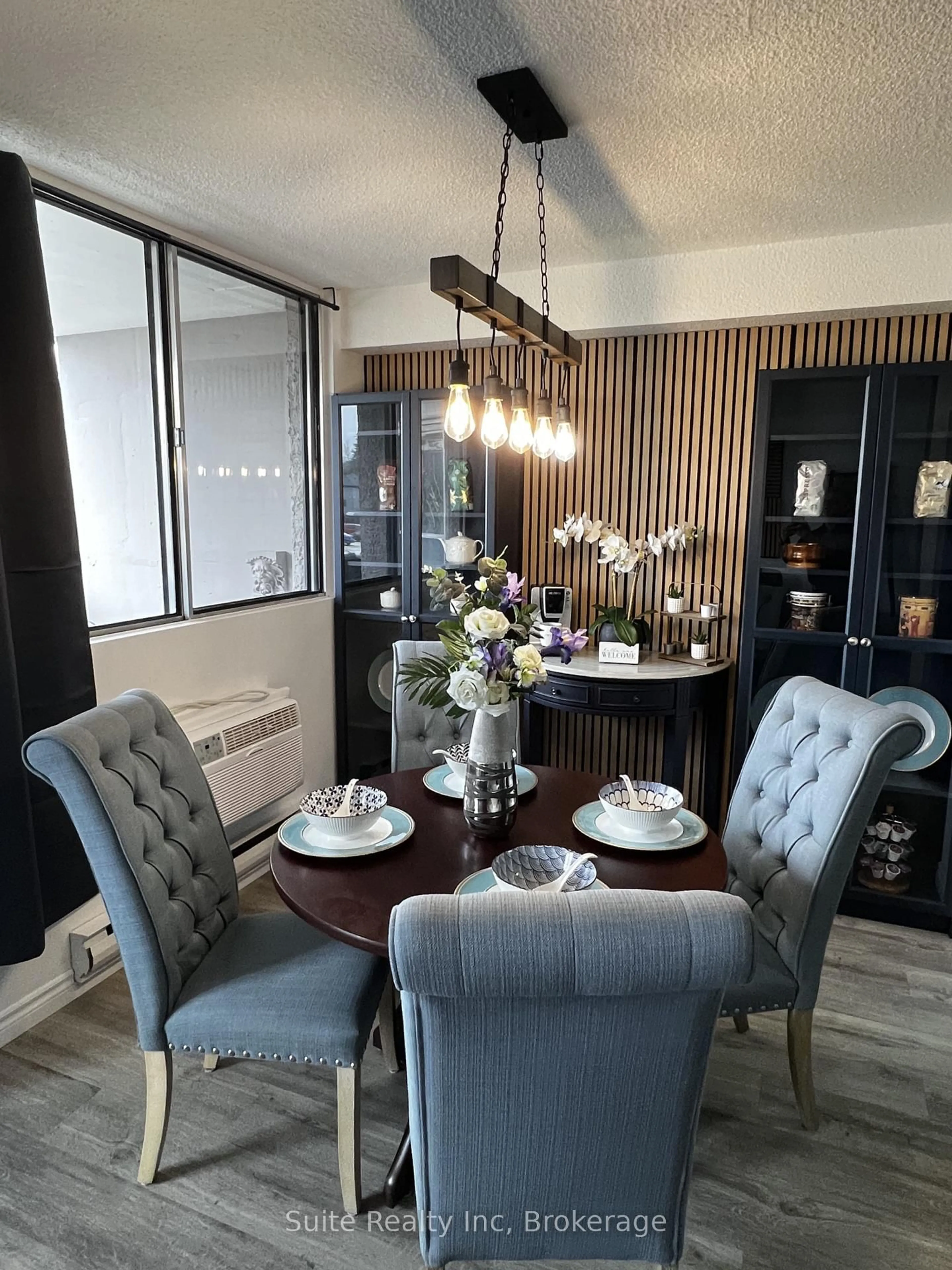 Dining room, wood/laminate floor for 81 Millside Dr #401, Milton Ontario L9T 3X4