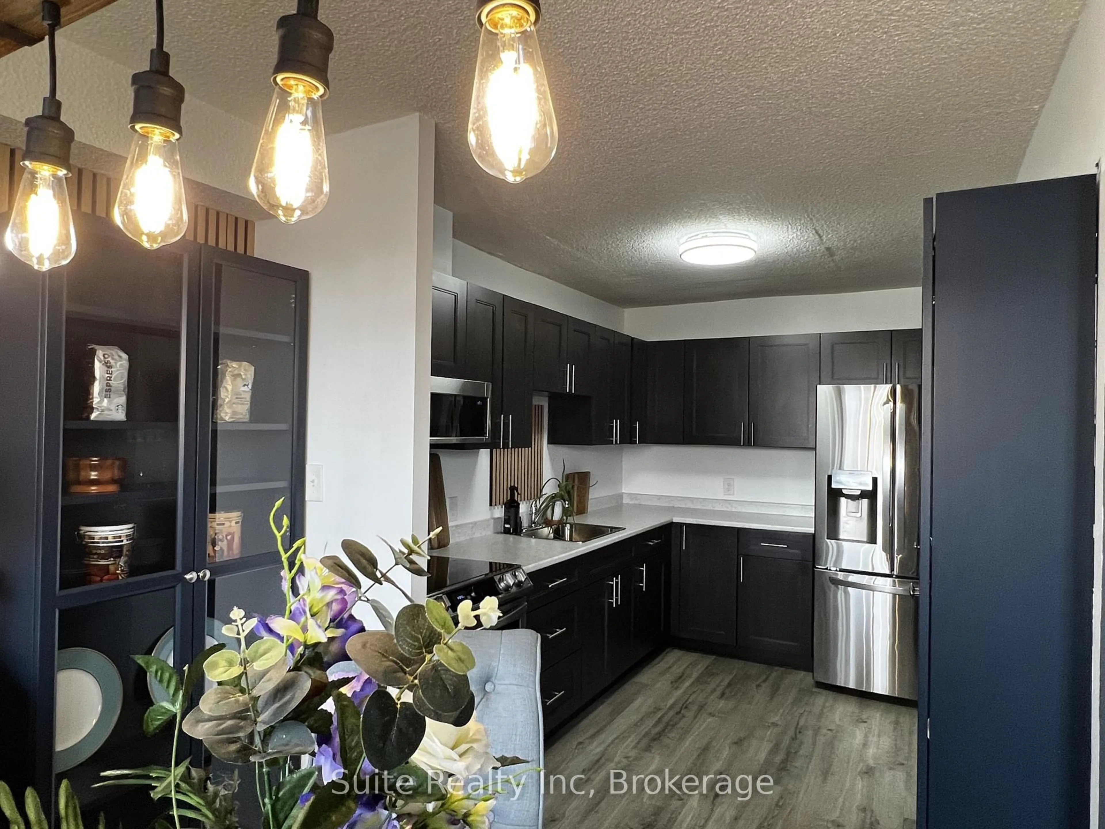 Open concept kitchen, unknown for 81 Millside Dr #401, Milton Ontario L9T 3X4