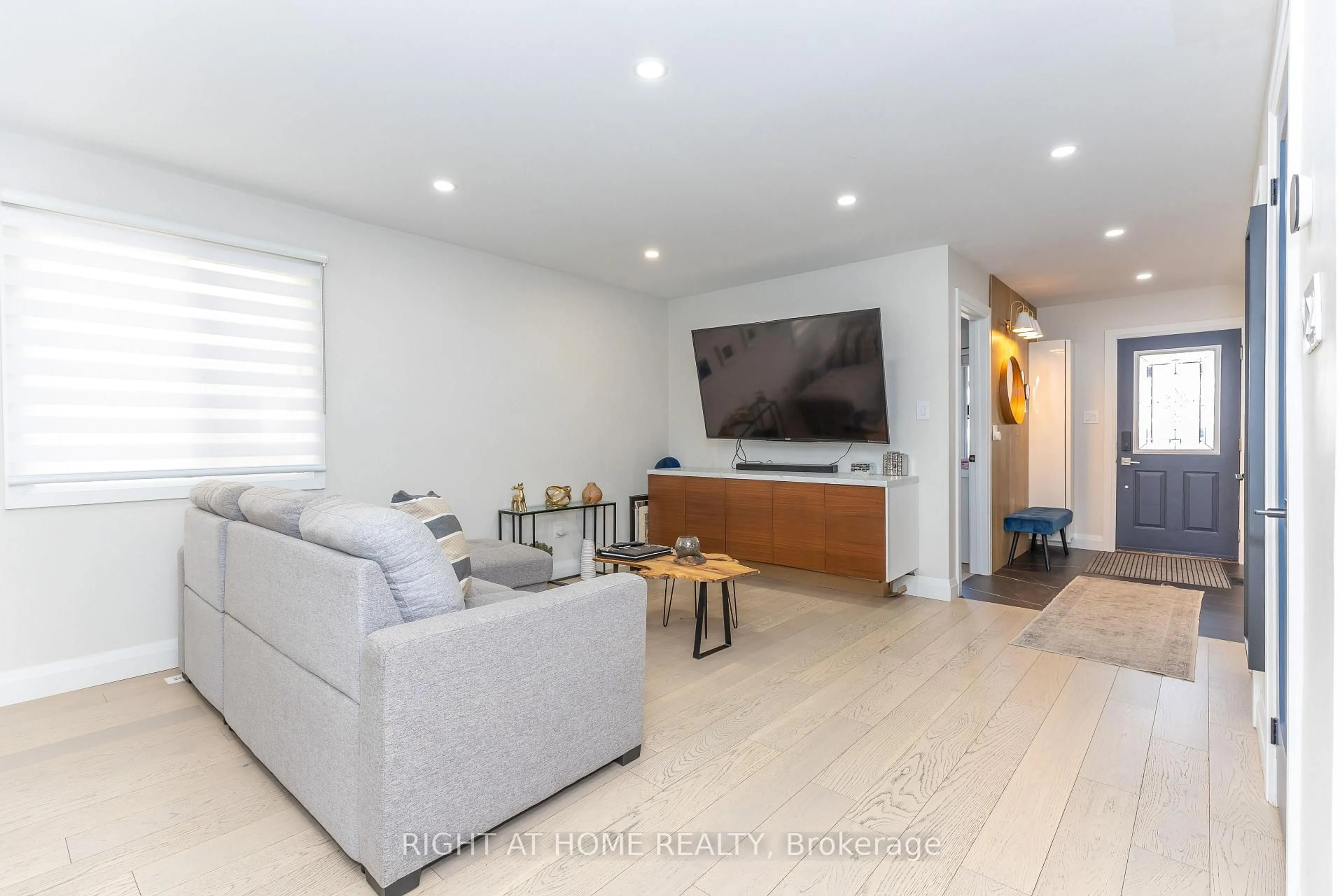 Living room with furniture, wood/laminate floor for 3512 Toffee St, Burlington Ontario L7M 3G3