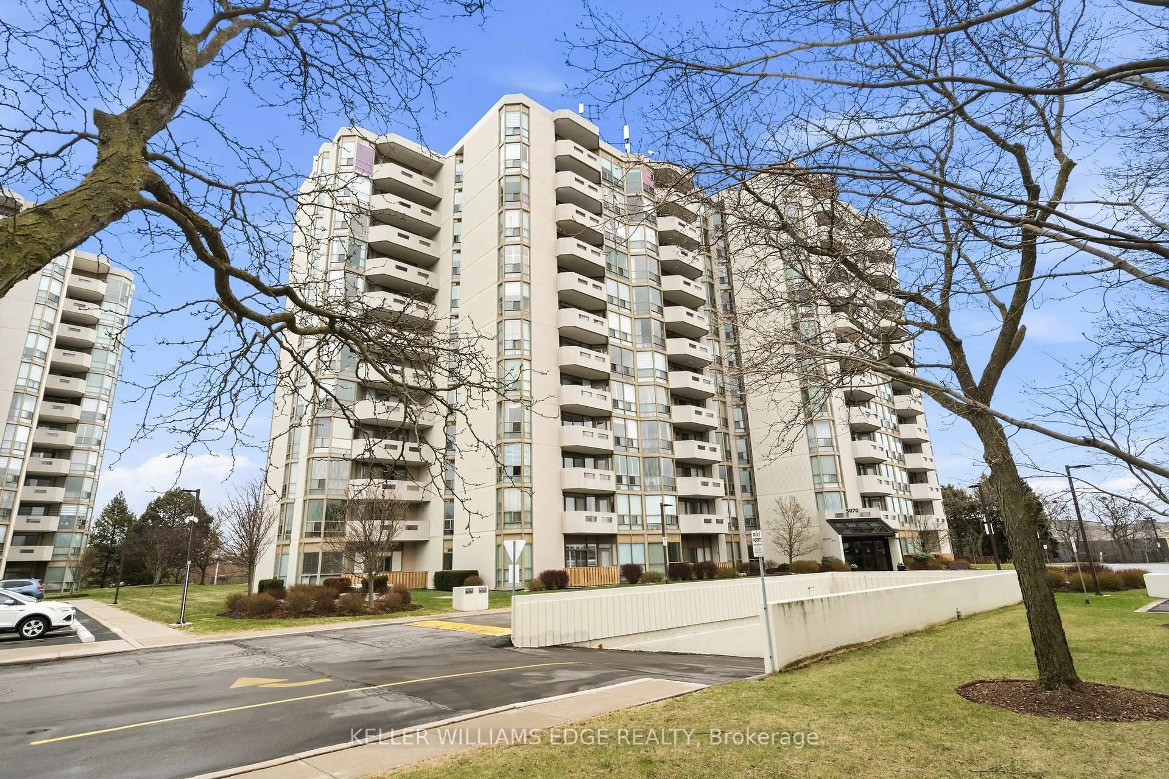 A pic from outside/outdoor area/front of a property/back of a property/a pic from drone, street for 5070 Pinedale Ave #407, Burlington Ontario L7L 5V6