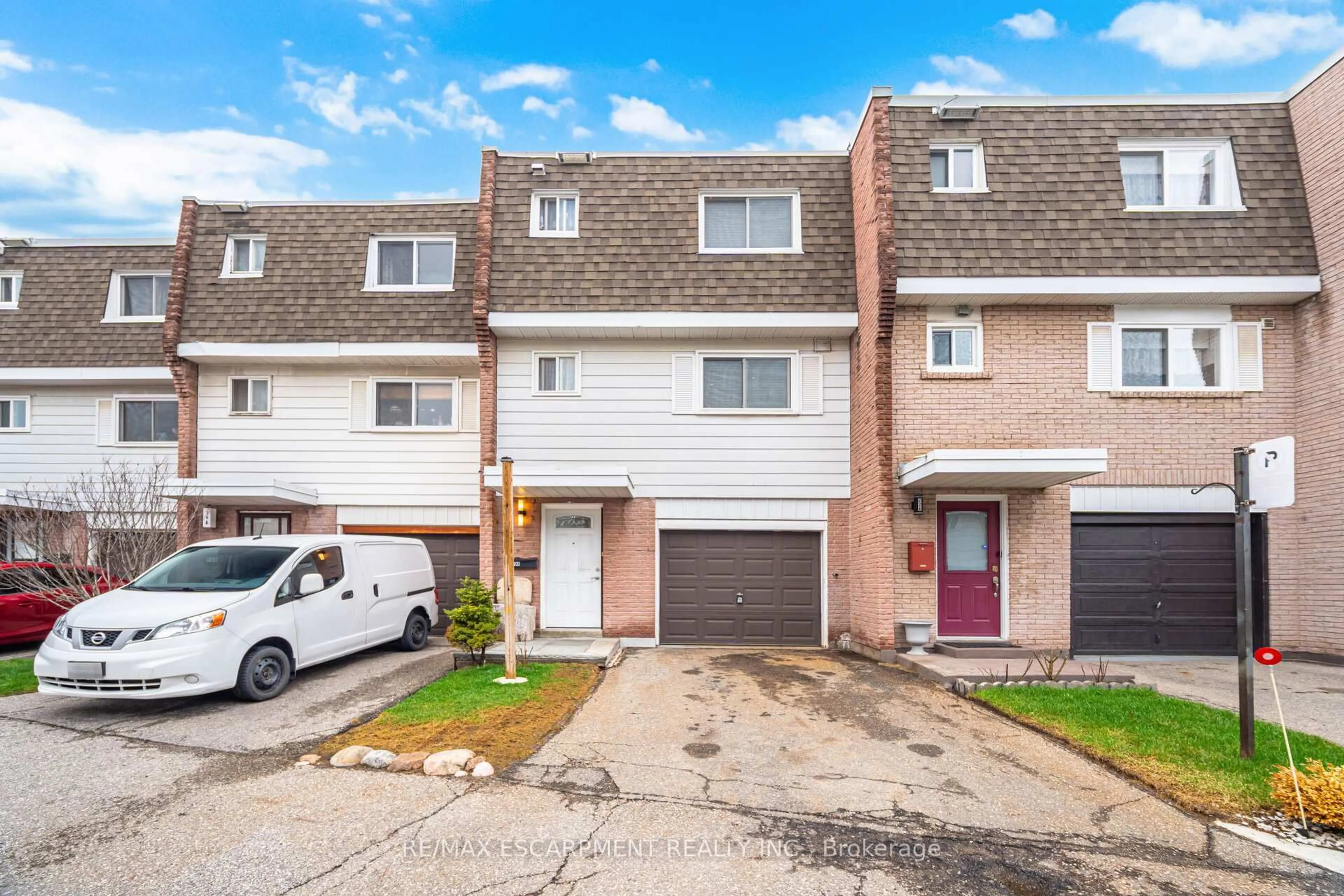 A pic from outside/outdoor area/front of a property/back of a property/a pic from drone, street for 830 Westlock Rd #20A, Mississauga Ontario L5C 1K6