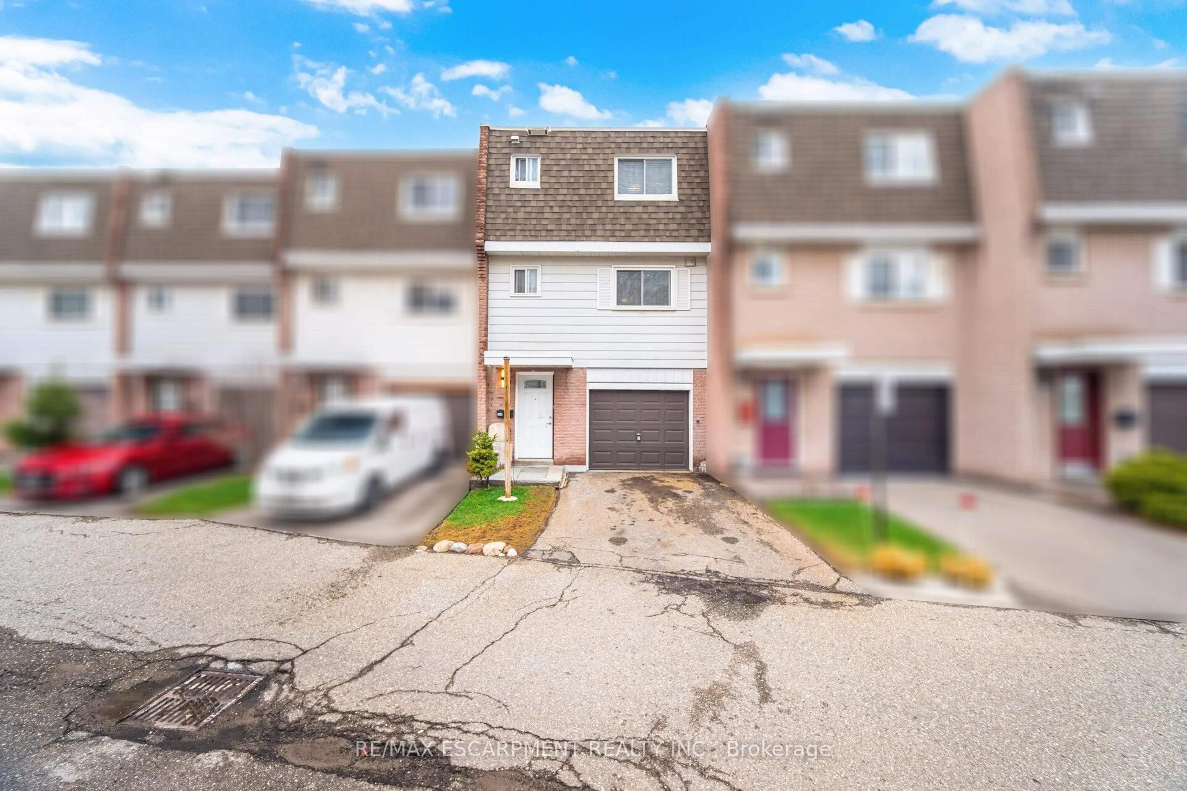 A pic from outside/outdoor area/front of a property/back of a property/a pic from drone, street for 830 Westlock Rd #20A, Mississauga Ontario L5C 1K6