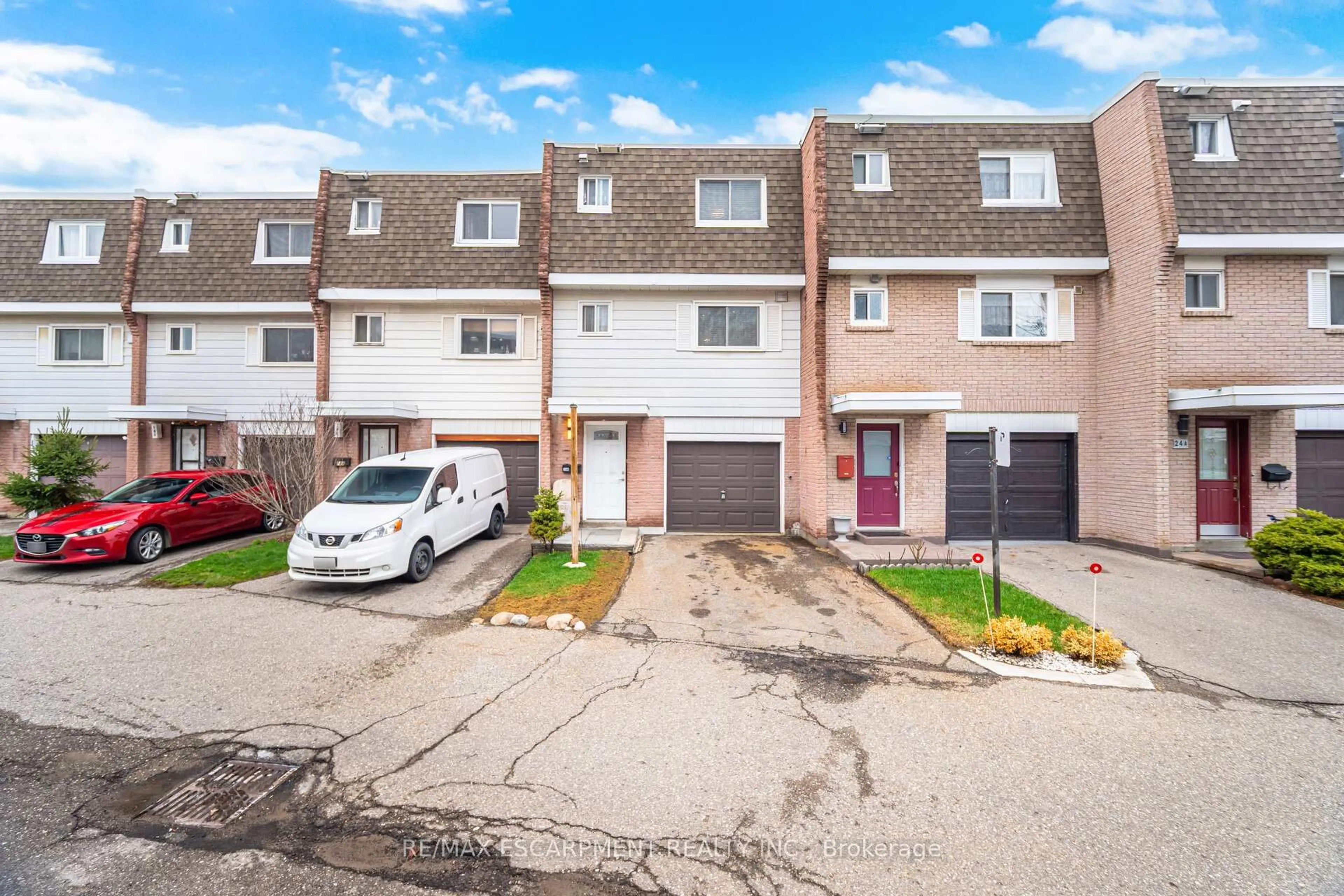 A pic from outside/outdoor area/front of a property/back of a property/a pic from drone, street for 830 Westlock Rd #20A, Mississauga Ontario L5C 1K6