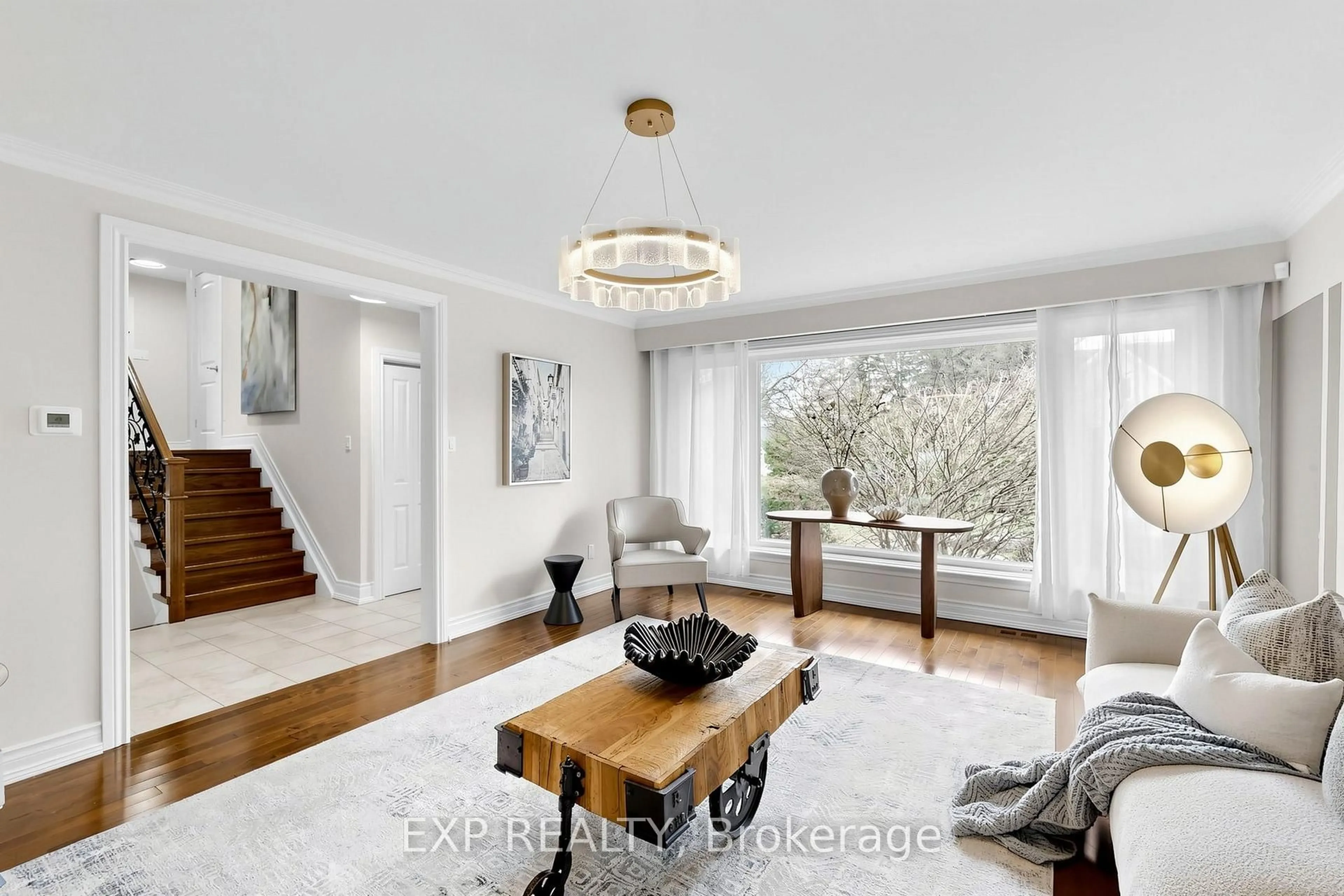 Living room with furniture, wood/laminate floor for 261 Pinehurst Dr, Oakville Ontario L6J 4X2