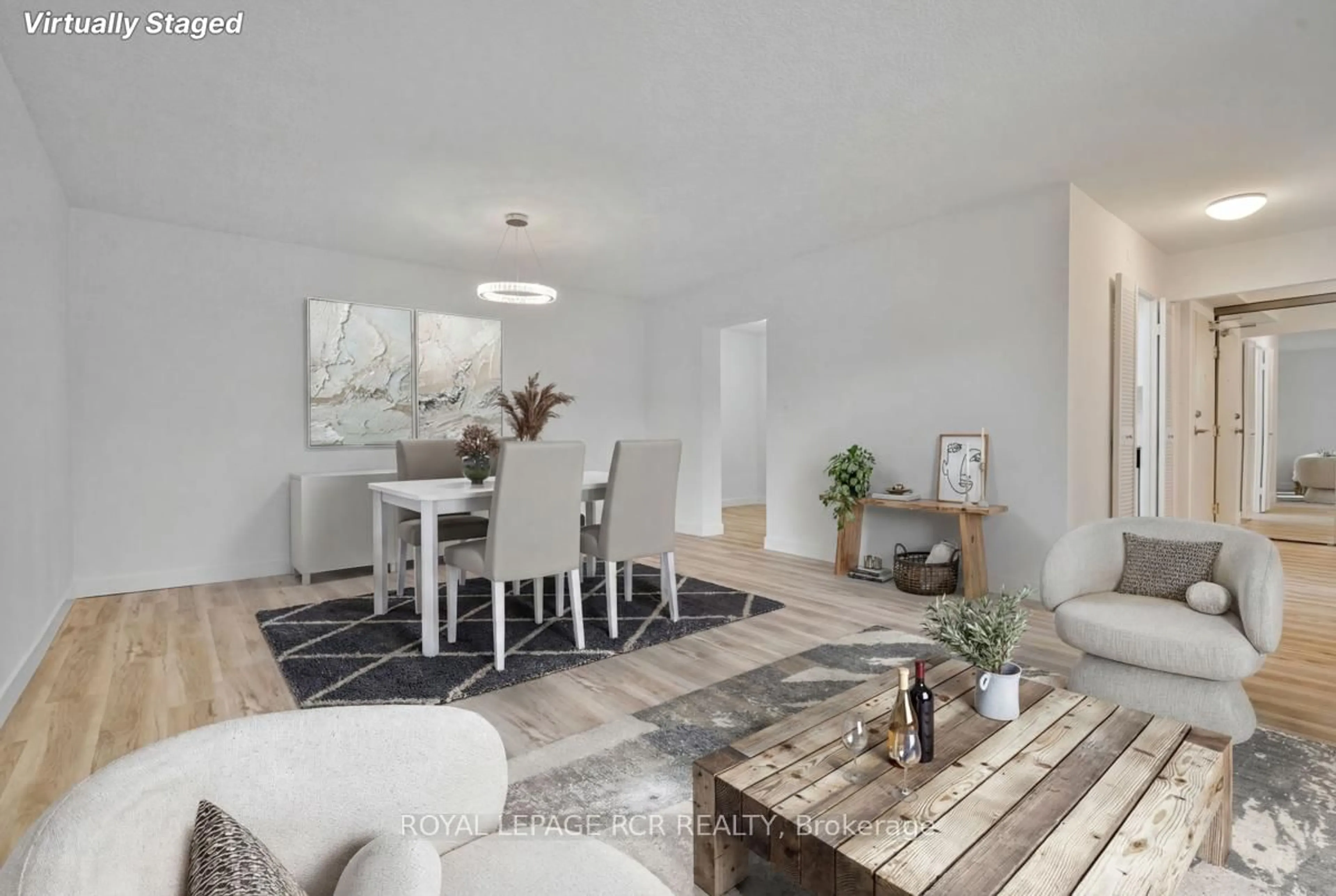 Living room with furniture, unknown for 1535 Lakeshore Rd #205, Mississauga Ontario L5E 3E2