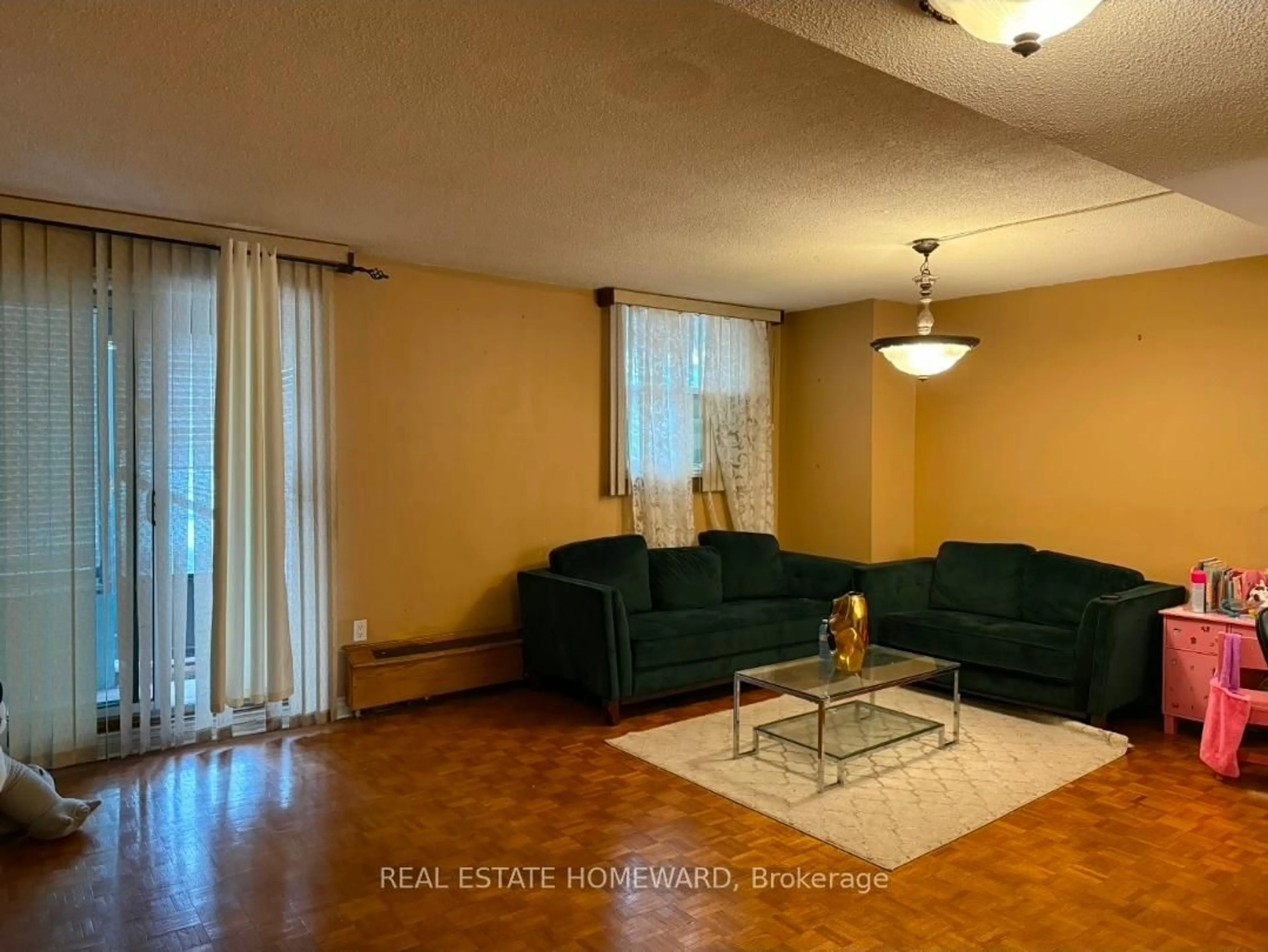 Living room with furniture, unknown for 235 Grandravine Dr #104, Toronto Ontario M3N 1J2