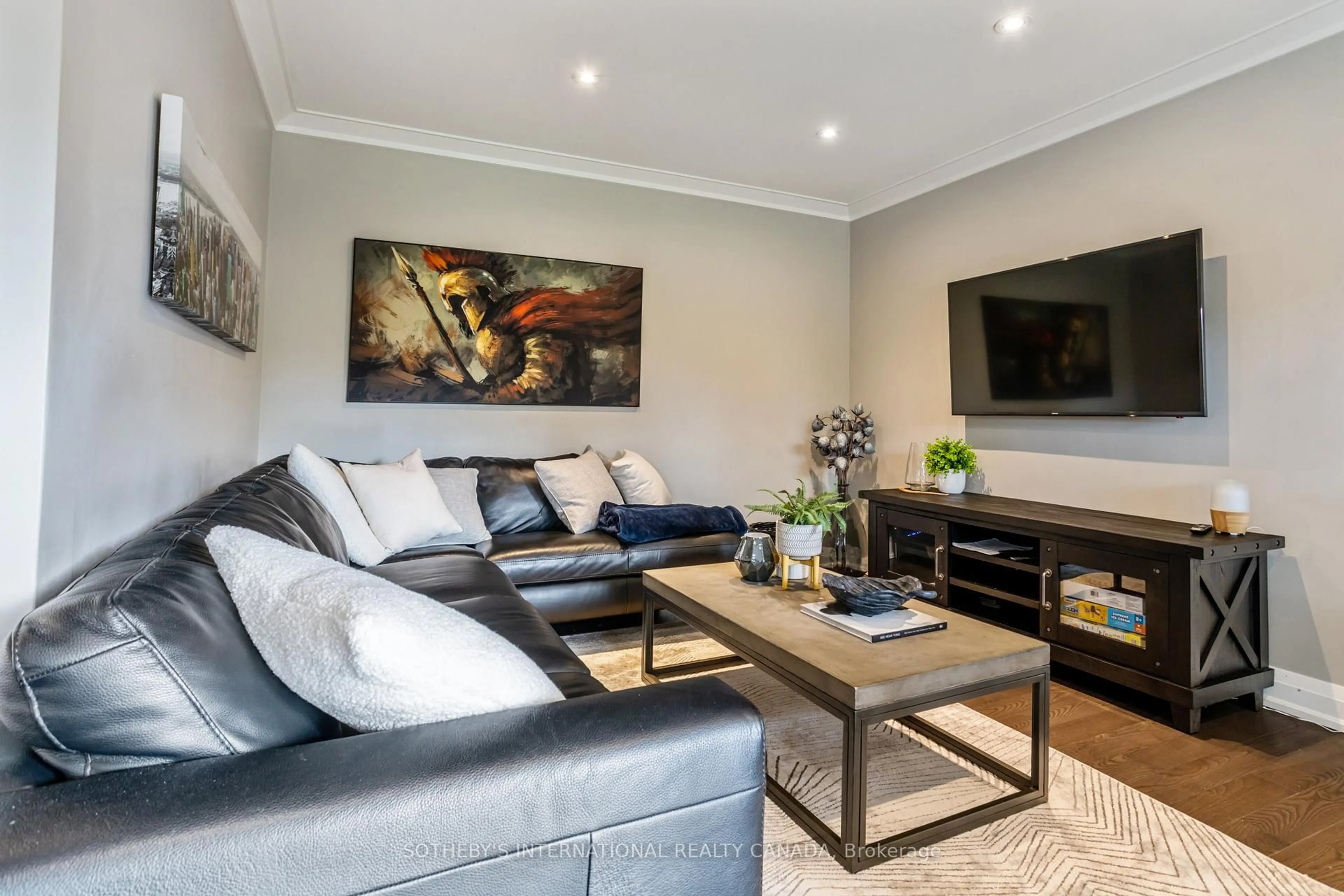 Living room with furniture, wood/laminate floor for 1491 Venta Ave, Mississauga Ontario L4X 1C9