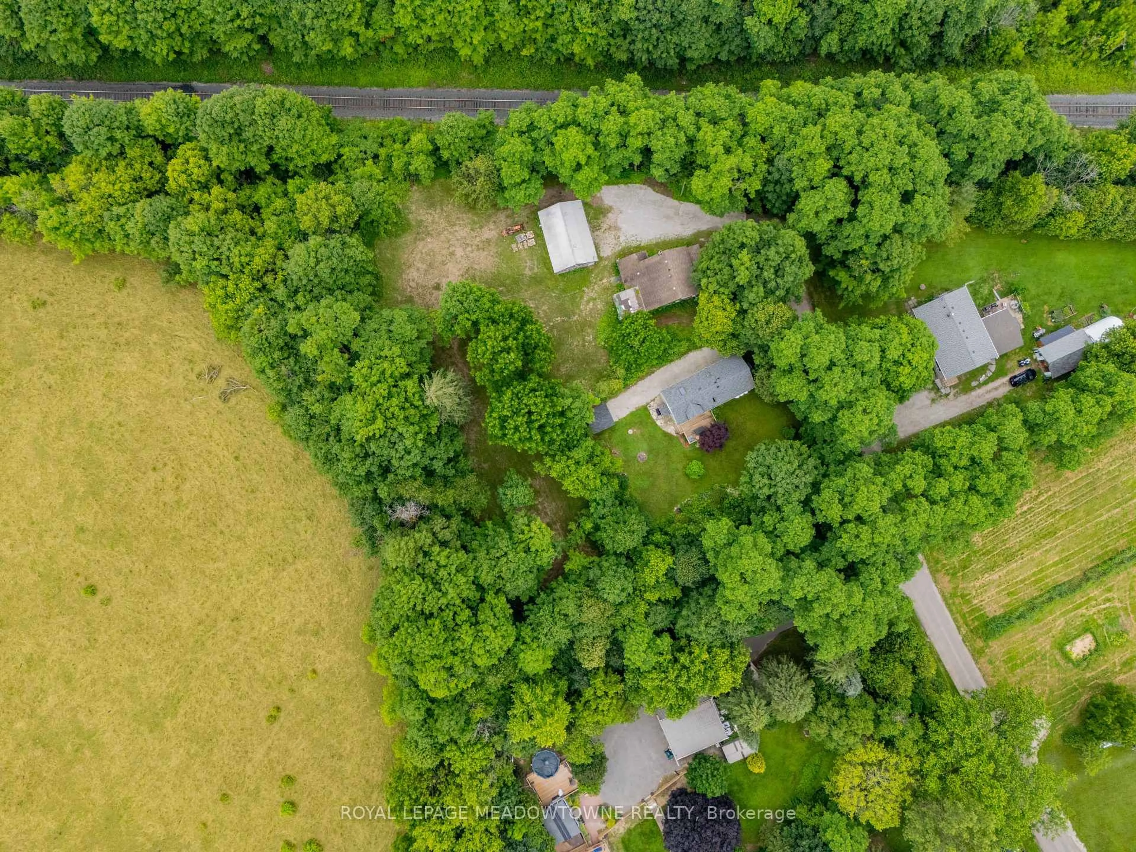 A pic from outside/outdoor area/front of a property/back of a property/a pic from drone, forest/trees view for 12363 Elizabeth St, Halton Hills Ontario L0P 1H0