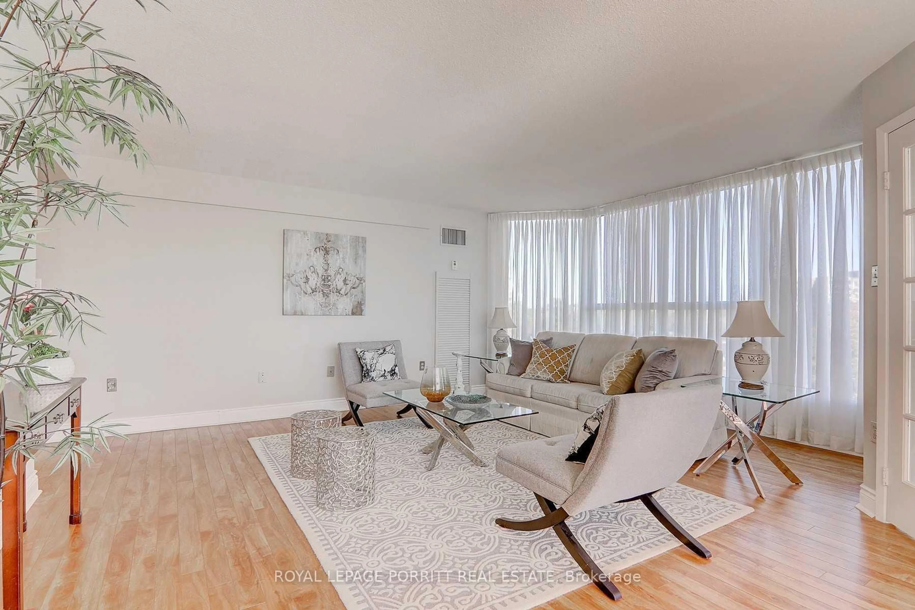 Living room with furniture, wood/laminate floor for 1271 Walden Circ #508, Mississauga Ontario L5J 4R4