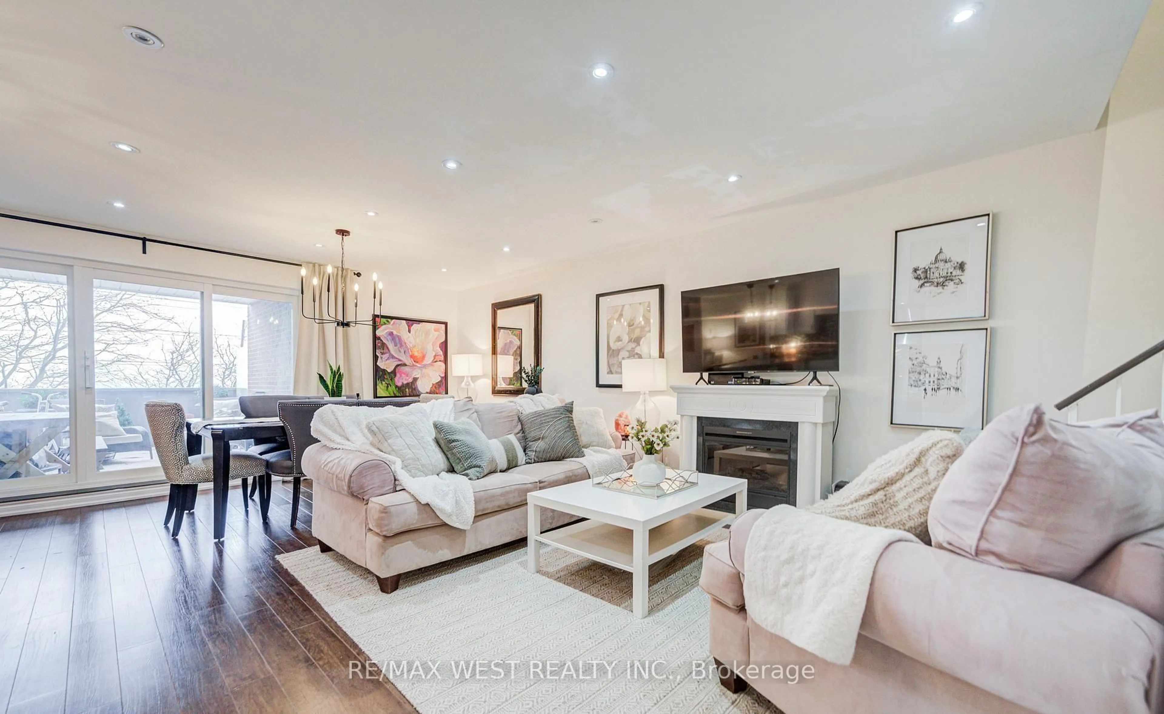 Living room with furniture, wood/laminate floor for 3025 The Credit Woodlands Dr #320, Mississauga Ontario L5C 2V3