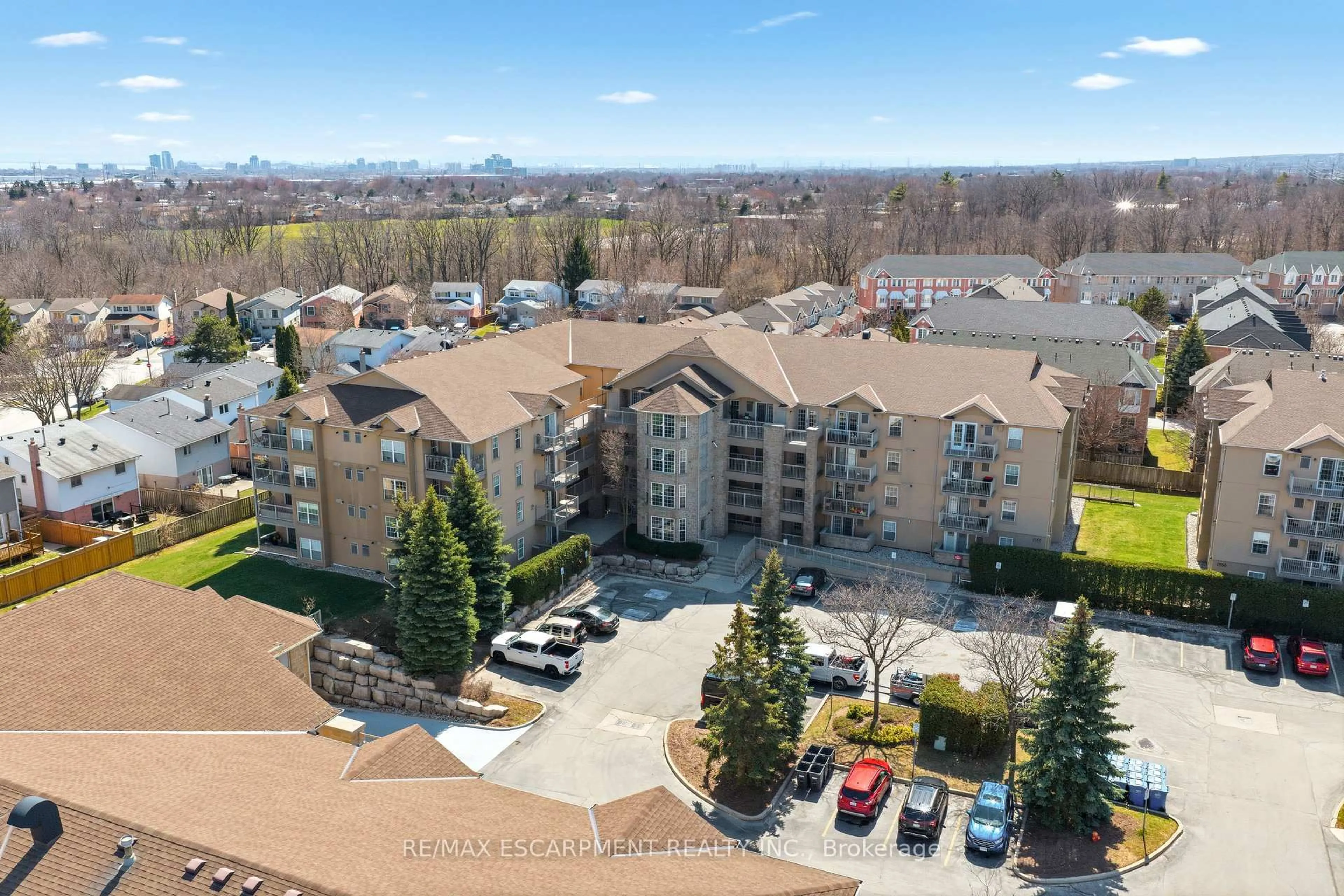 A pic from outside/outdoor area/front of a property/back of a property/a pic from drone, mountain view for 1820 Walkers Line #213, Burlington Ontario L7M 4V4