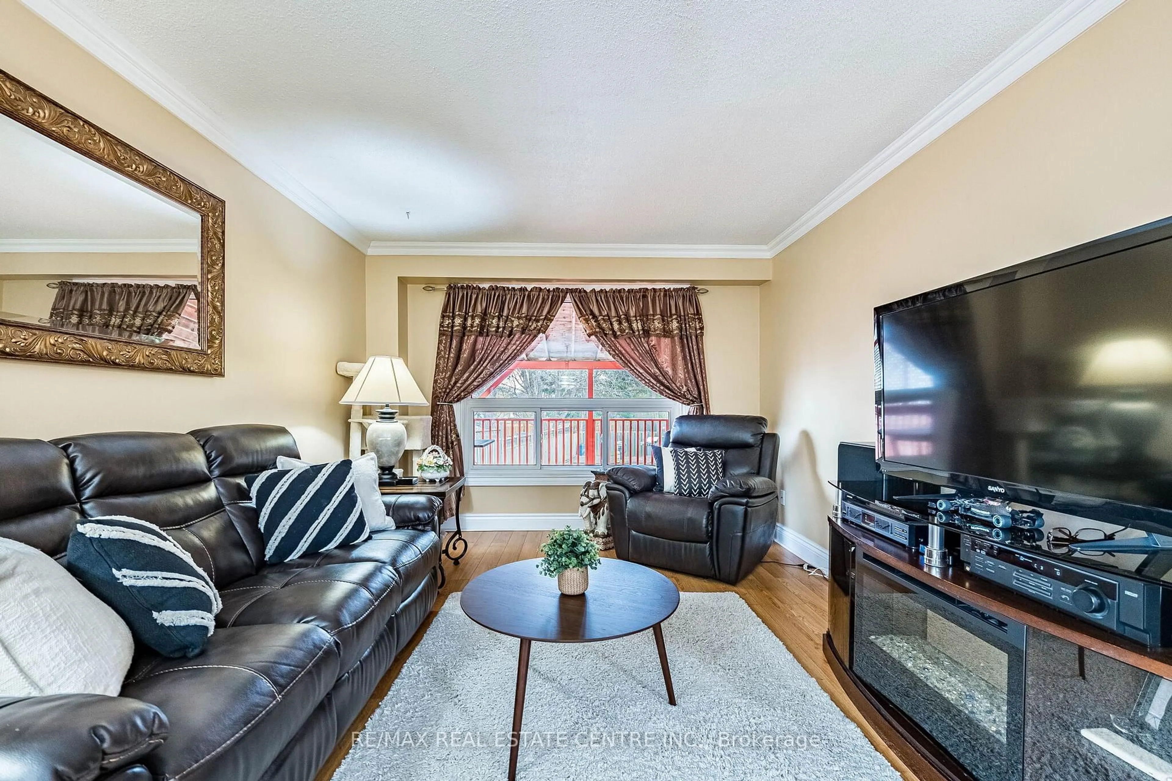 Living room with furniture, unknown for 1 Northgate Blvd, Brampton Ontario L6S 4G6