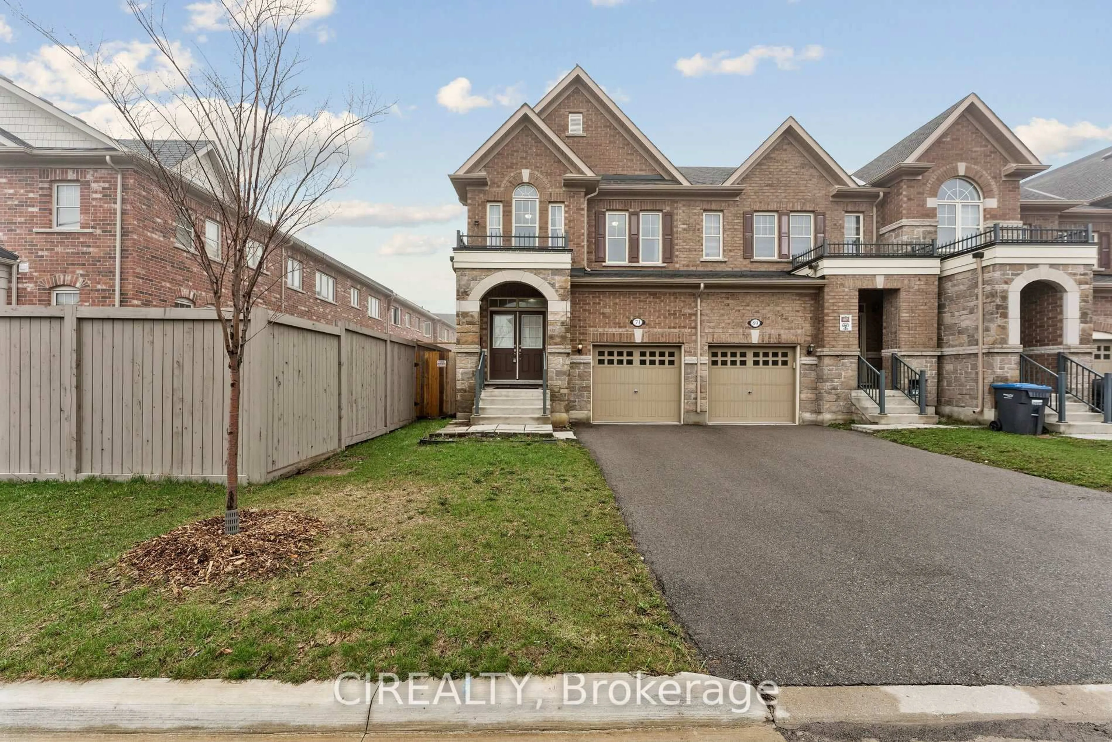 Home with brick exterior material, street for 71 Finegan Circ, Brampton Ontario L7A 4Z8