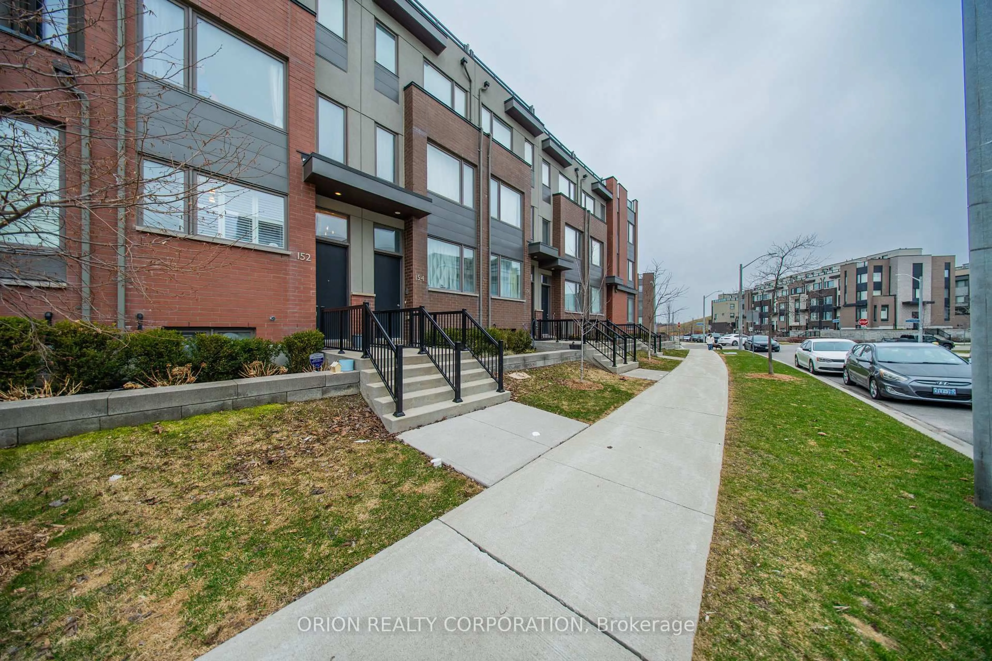 A pic from outside/outdoor area/front of a property/back of a property/a pic from drone, street for 152 Frederick Tisdale Dr, Toronto Ontario M3K 0A8
