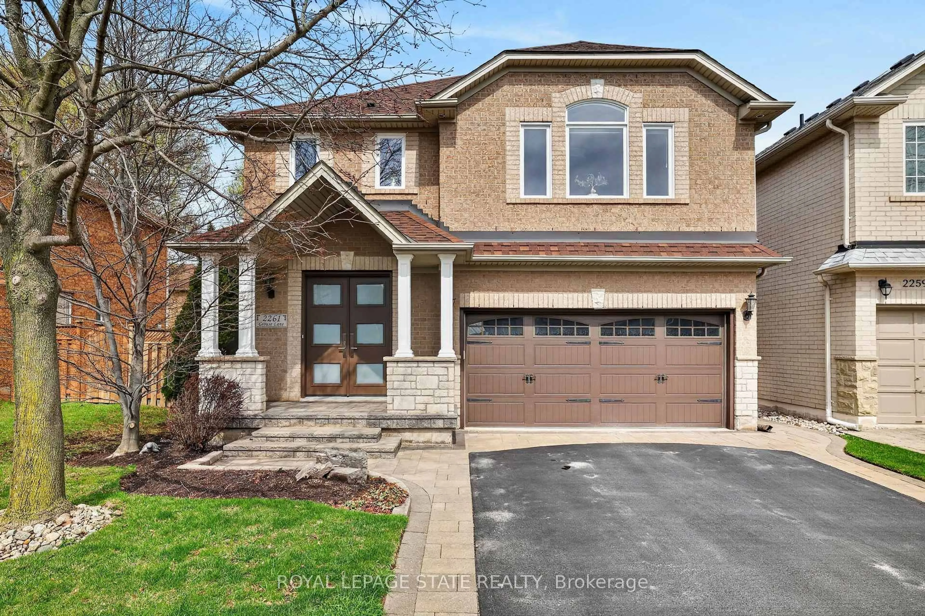 Home with brick exterior material, street for 2261 Grouse Lane, Oakville Ontario L6M 3Z8