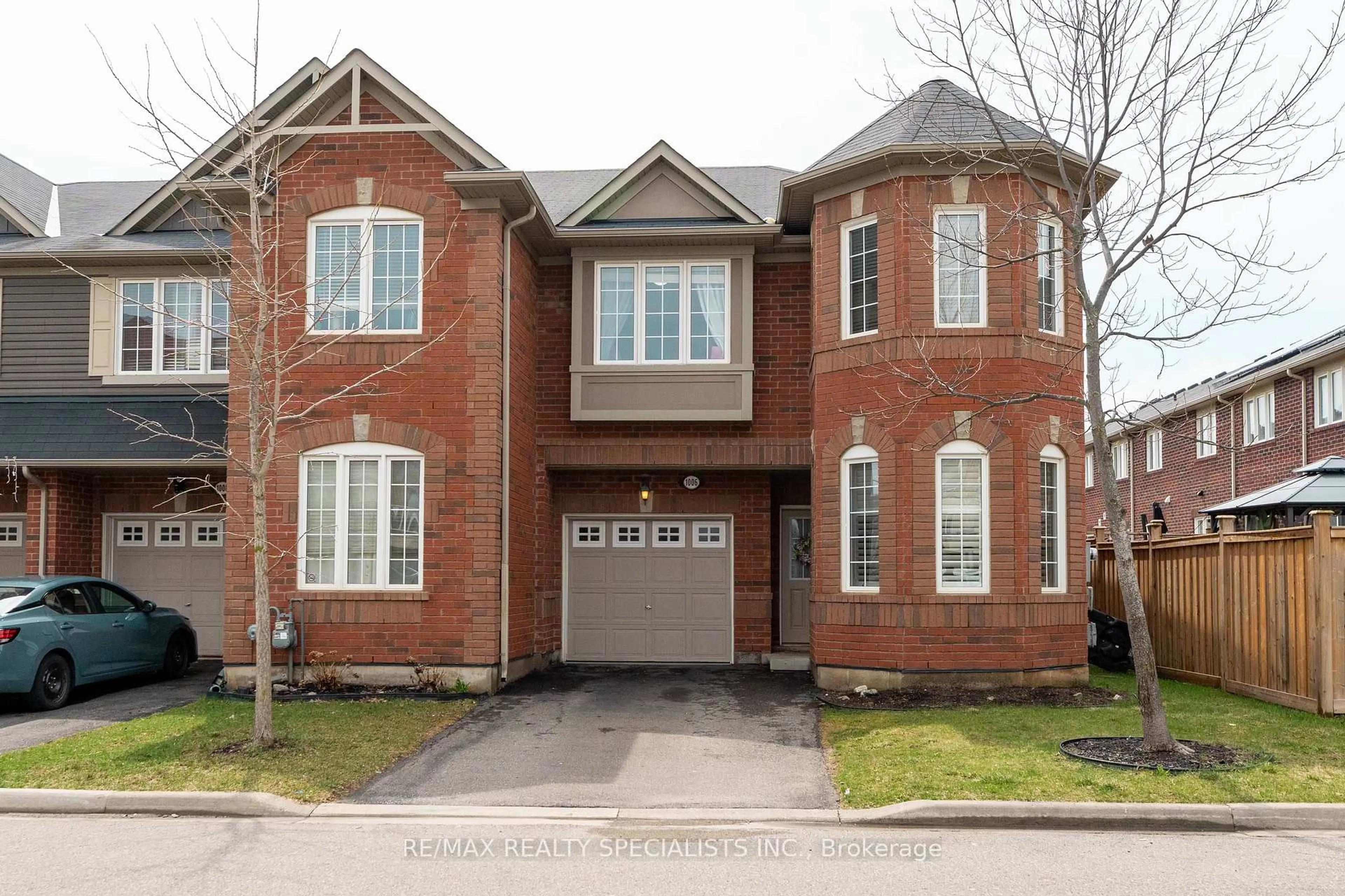 Home with brick exterior material, street for 1006 Stemman Pl, Milton Ontario L9T 8H5