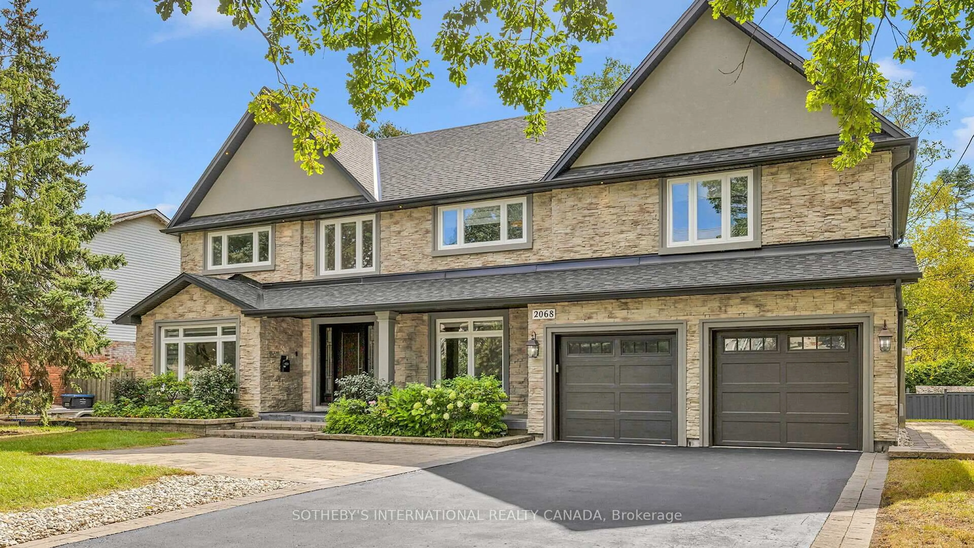 Home with brick exterior material, street for 2068 Mississauga Rd, Mississauga Ontario L5H 2K6