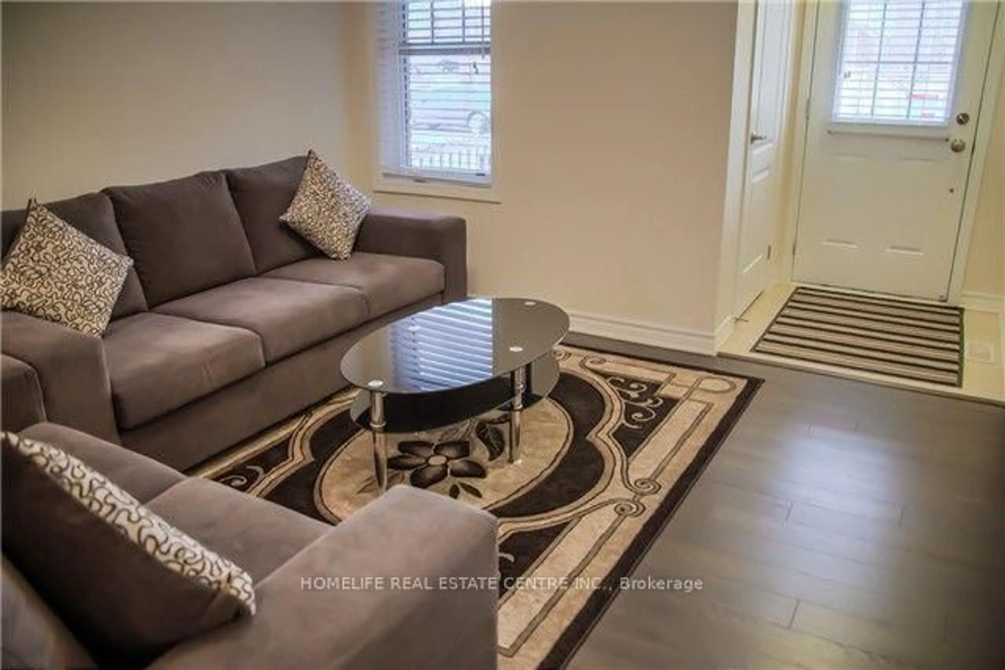 Living room with furniture, unknown for 45 Lothbury Dr, Brampton Ontario L7A 4G6