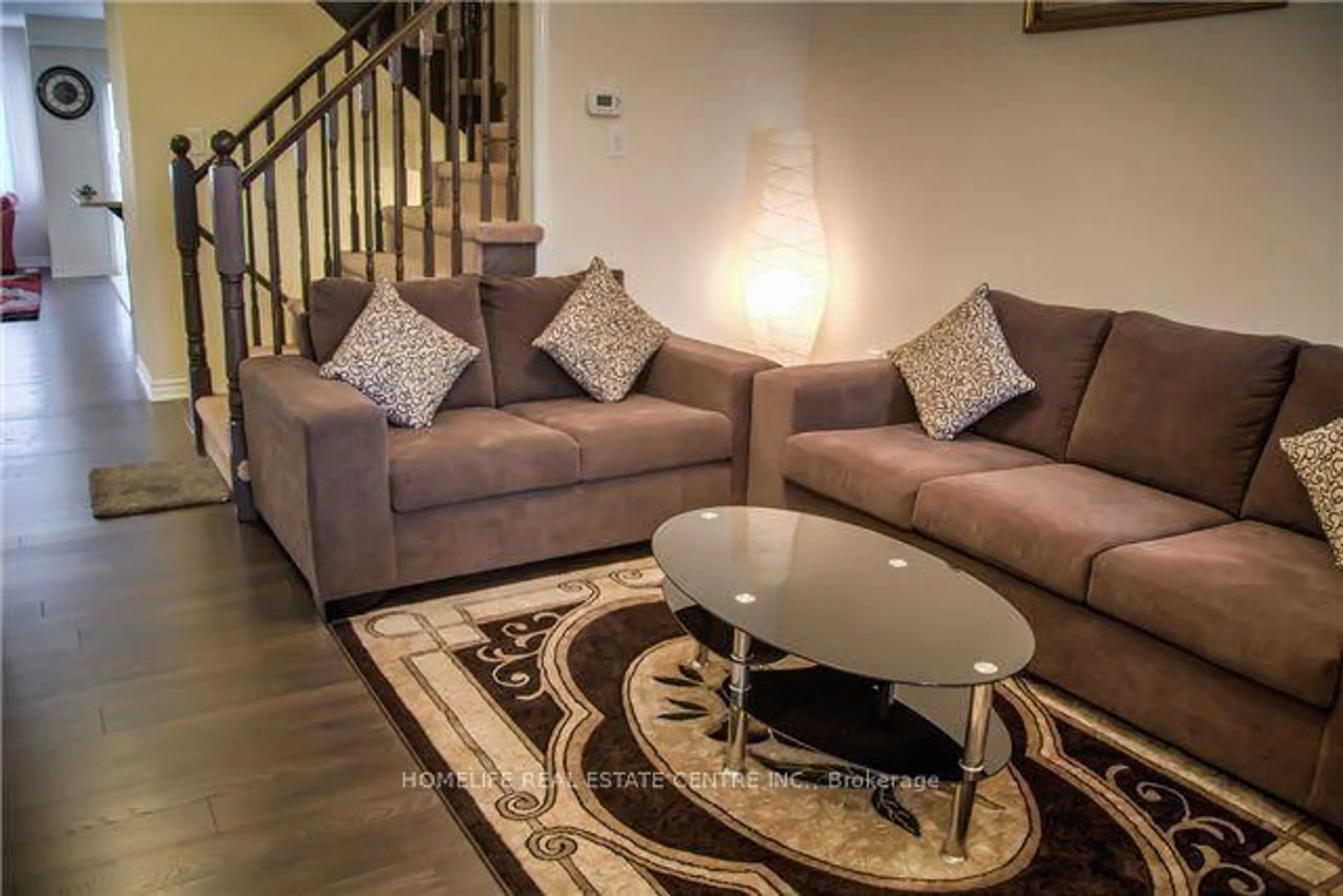 Living room with furniture, carpet floor for 45 Lothbury Dr, Brampton Ontario L7A 4G6