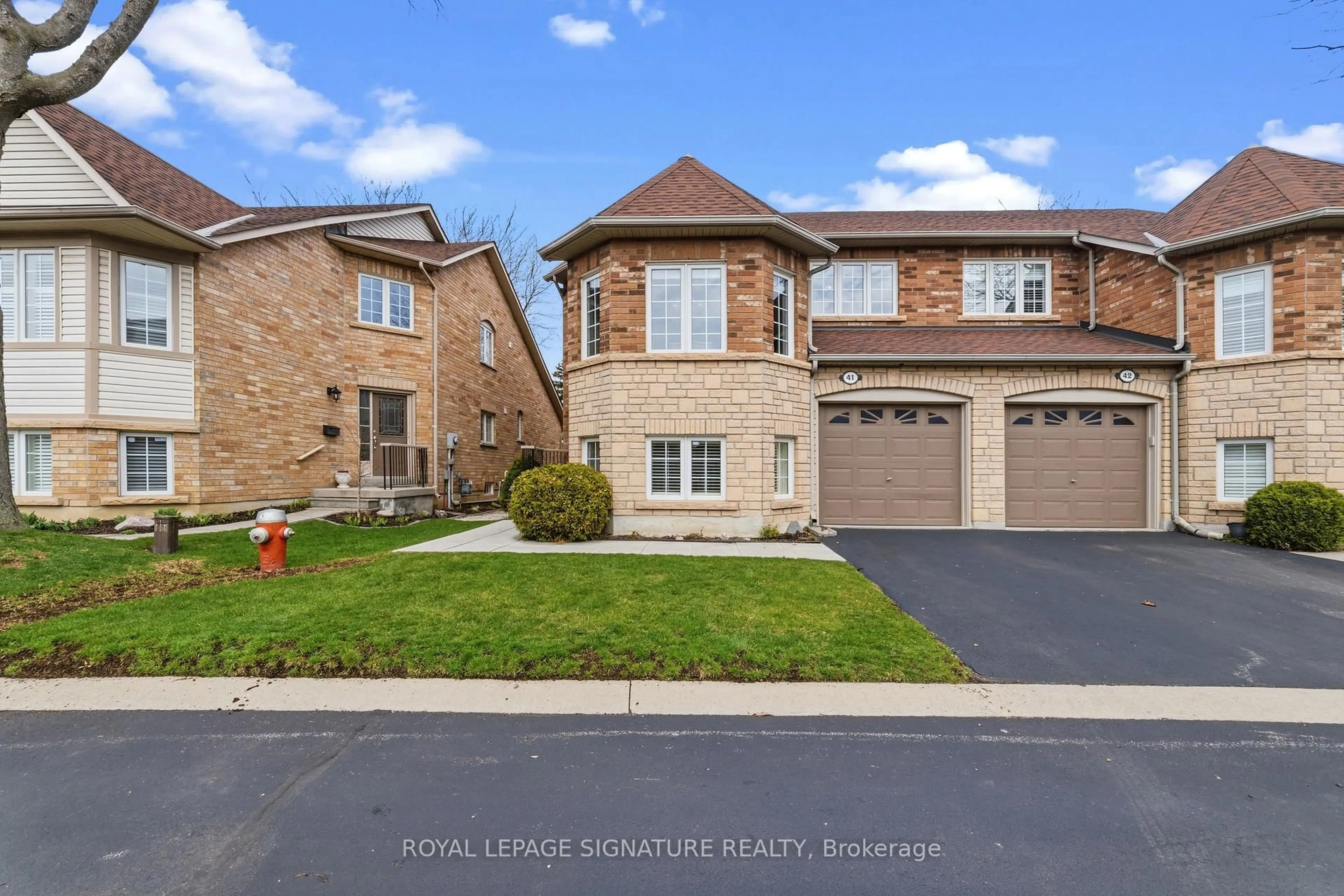 Home with brick exterior material, street for 223 Rebecca St #41, Oakville Ontario L6K 3Y2