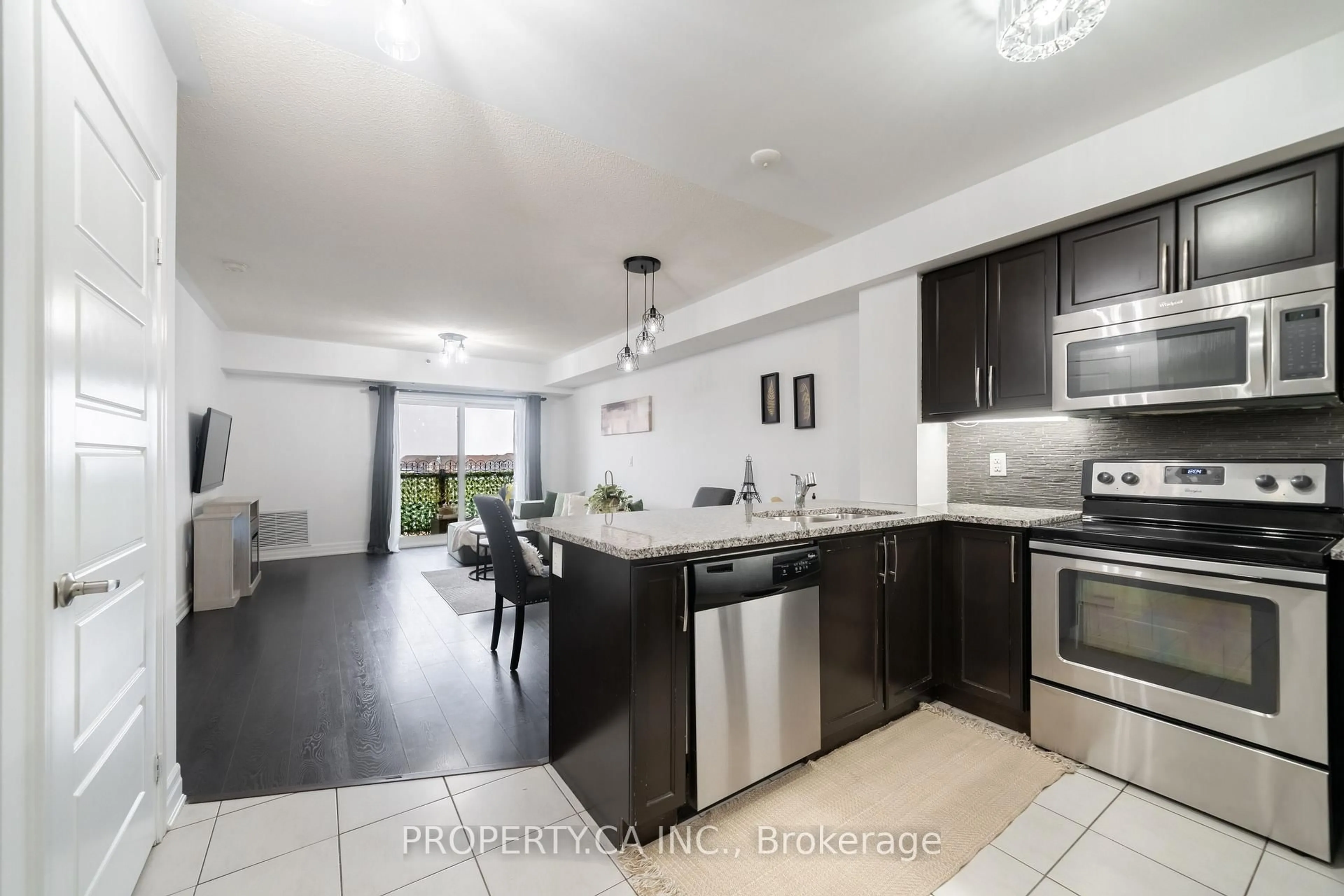 Open concept kitchen, ceramic/tile floor for 70 Baycliffe Cres #412, Brampton Ontario L7A 0Z5
