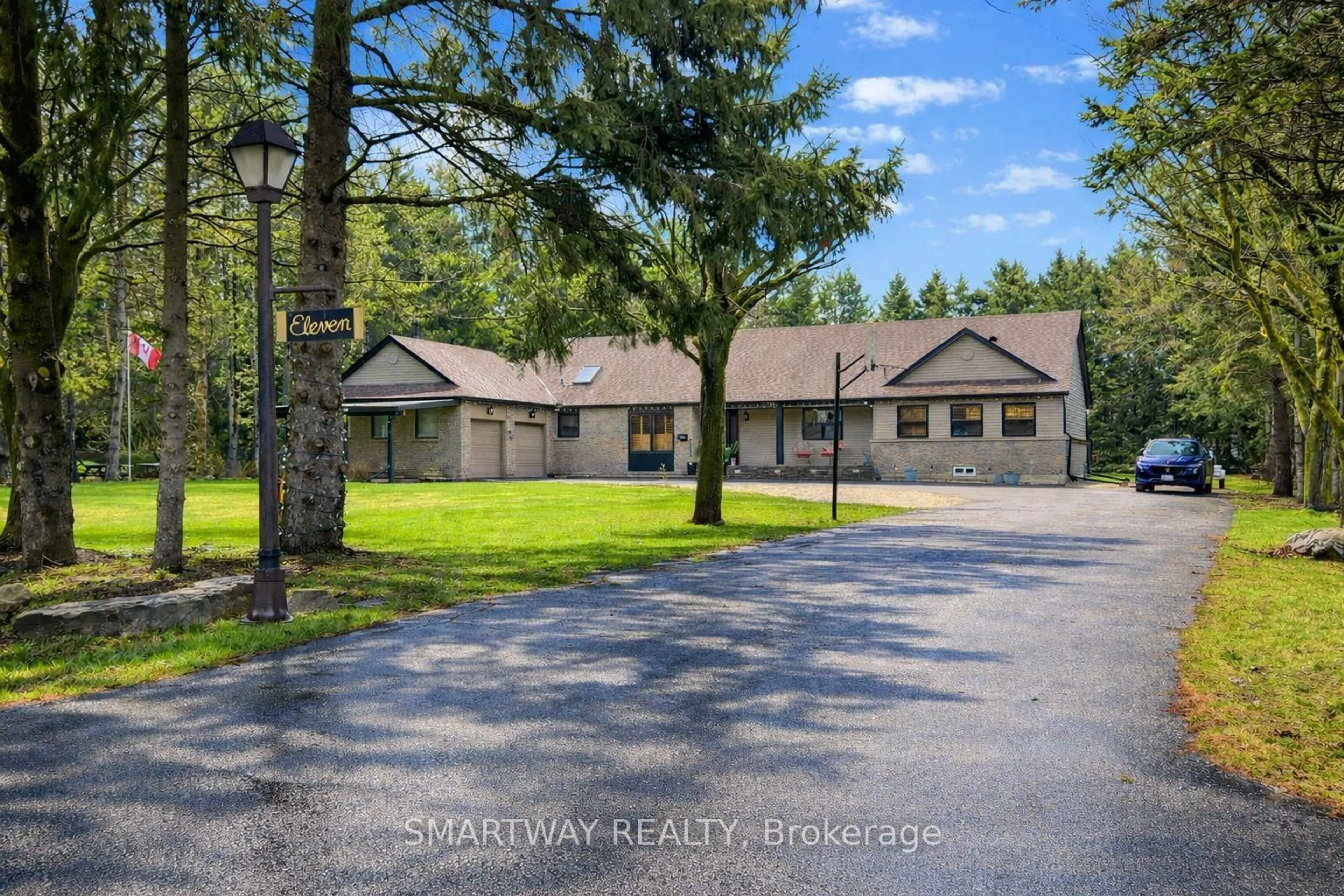 A pic from outside/outdoor area/front of a property/back of a property/a pic from drone, unknown for 11 Meadow Dr, Caledon Ontario L7K 1A2