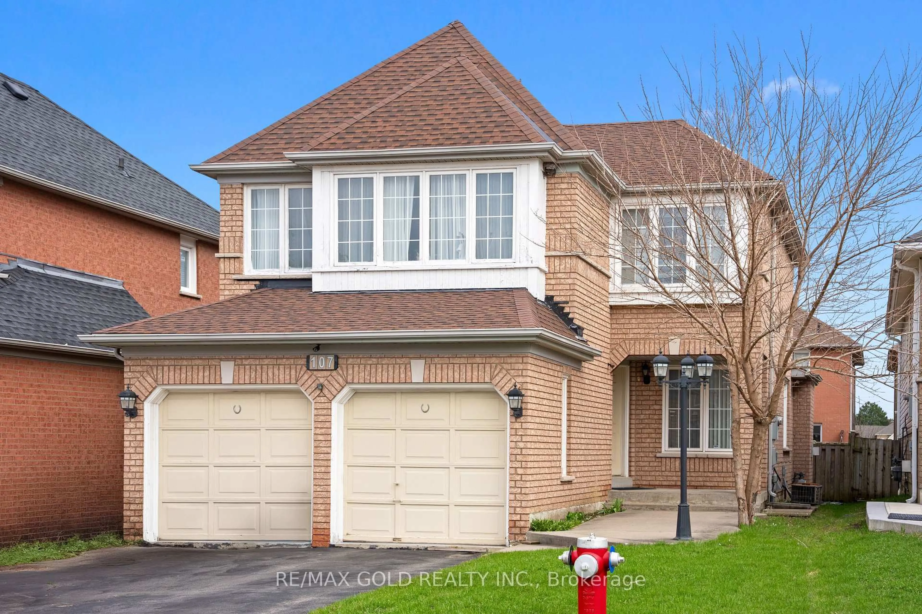 Home with brick exterior material, street for 107 Seclusion Cres, Brampton Ontario L6R 1K8
