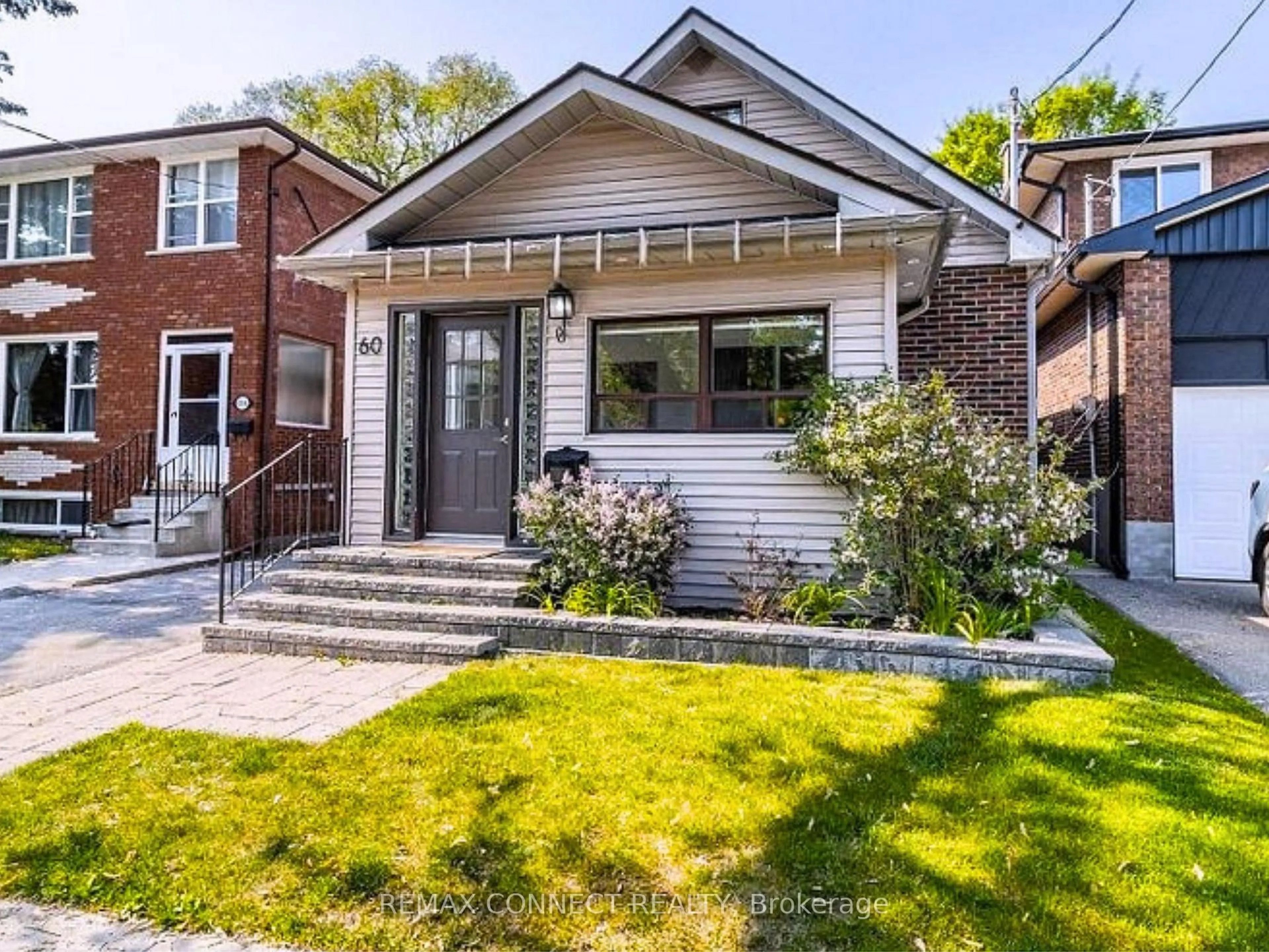 Home with brick exterior material, street for 60 Woodbury Rd, Toronto Ontario M8W 1X7