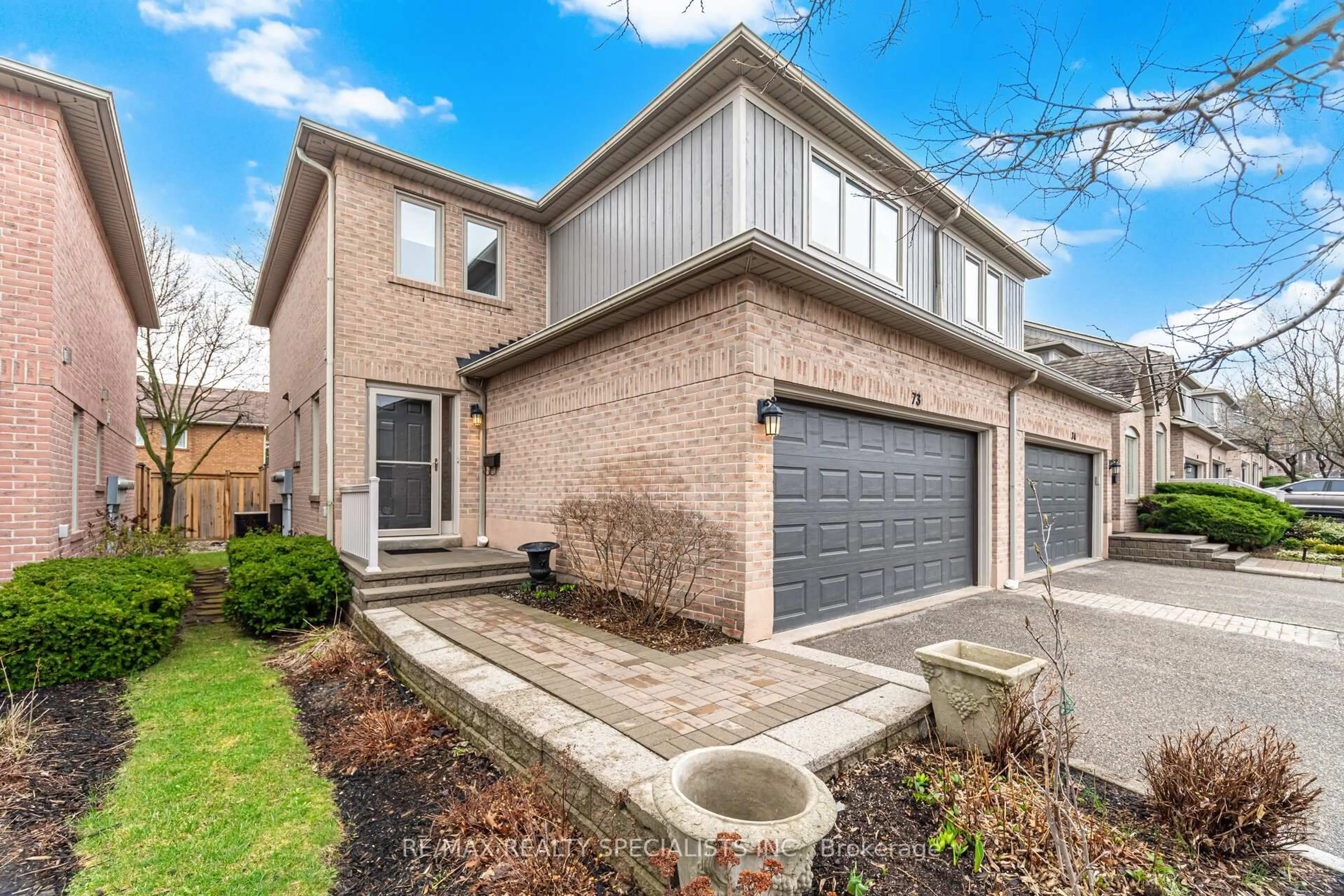 Home with brick exterior material, street for 5480 Glen Erin Dr #73, Mississauga Ontario L5M 5R3