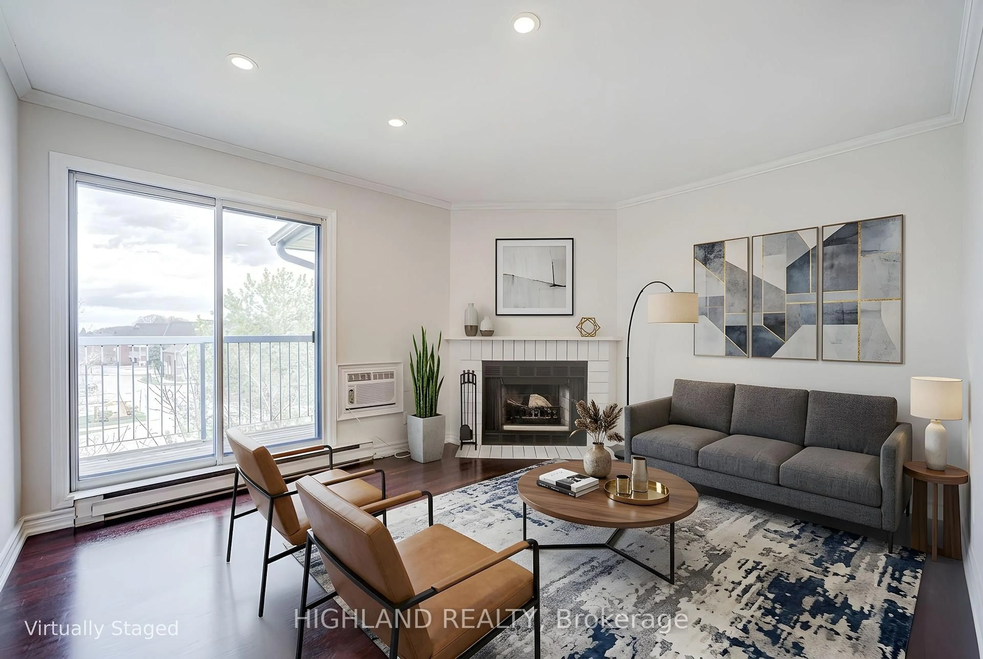 Living room with furniture, wood/laminate floor for 95 Trailwood Dr #1033, Mississauga Ontario L4Z 3L2