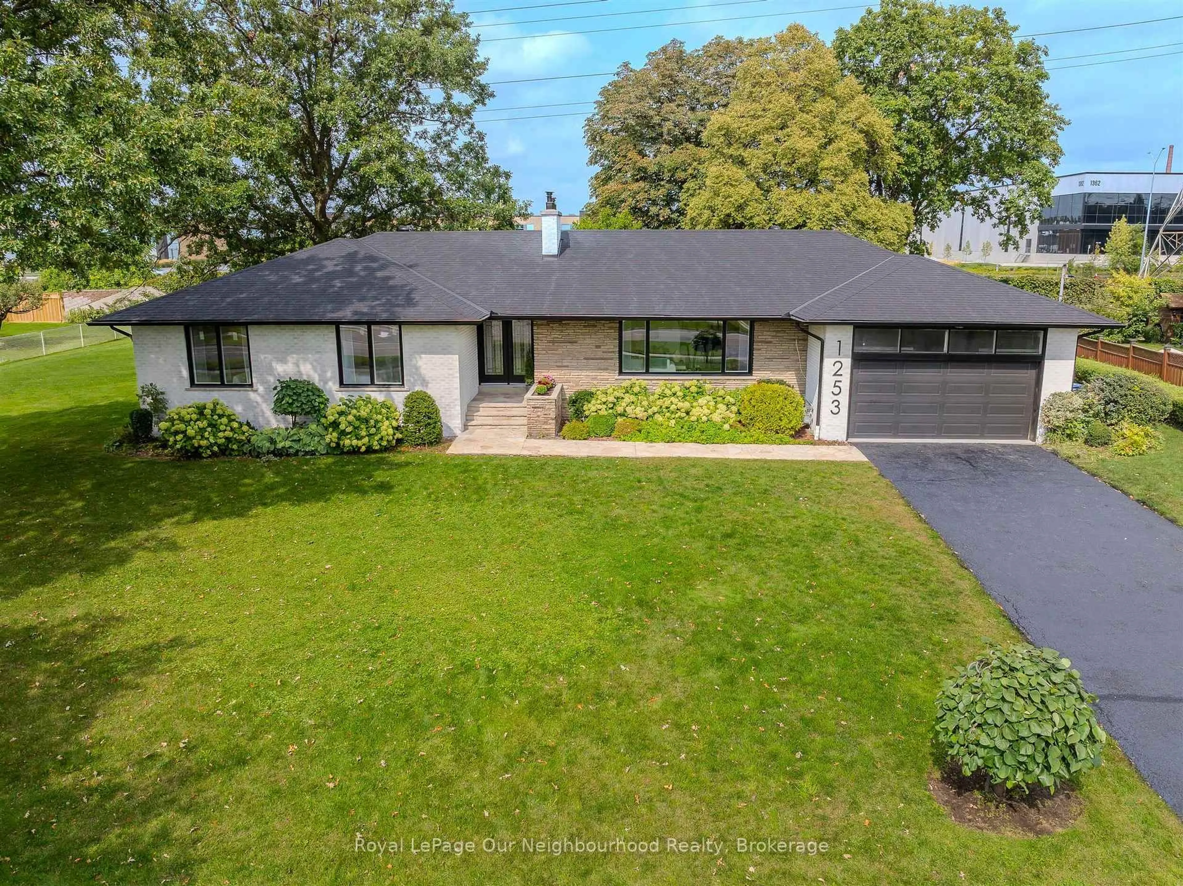 A pic from outside/outdoor area/front of a property/back of a property/a pic from drone, street for 1253 Melton Dr, Mississauga Ontario L4Y 1L6