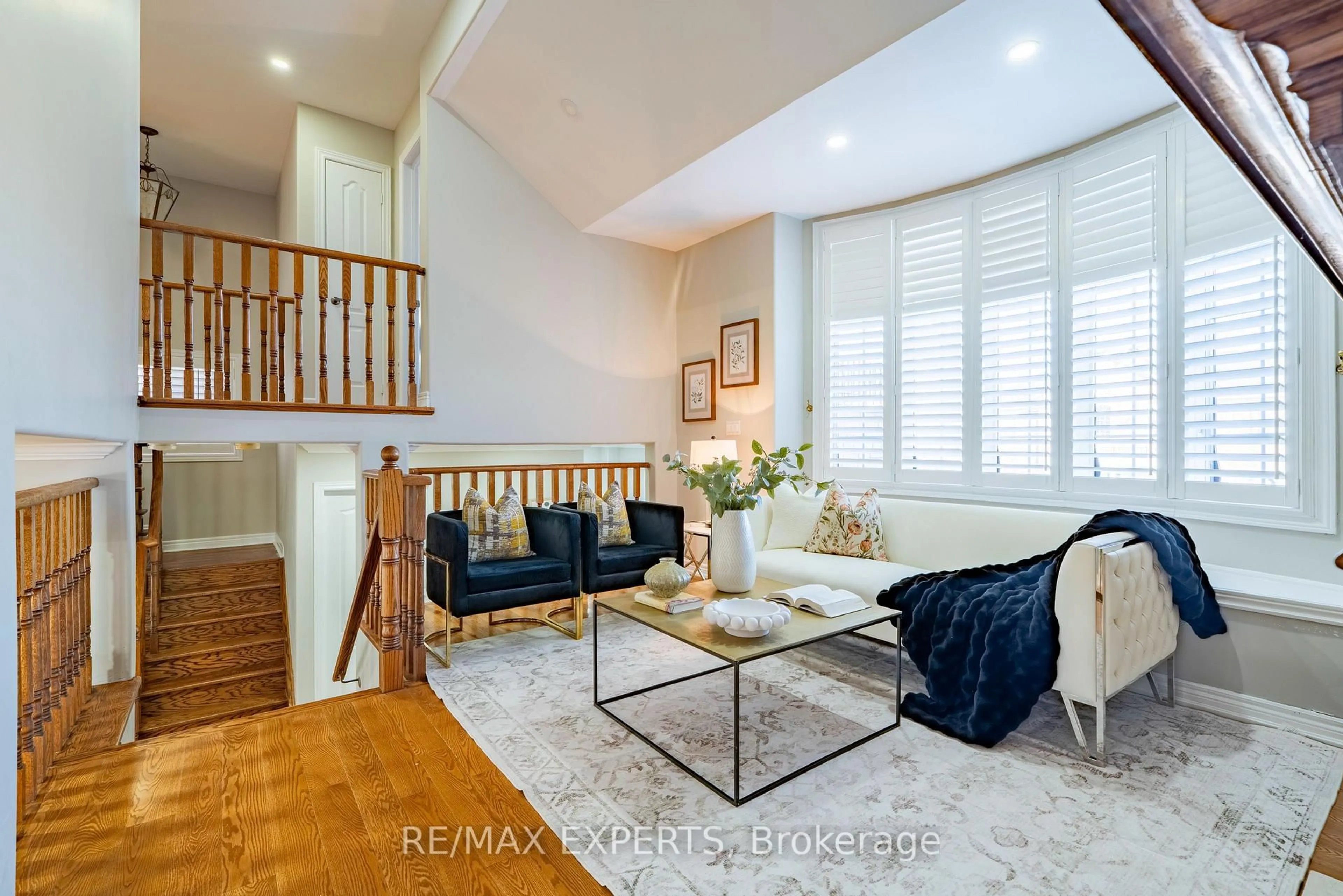 Living room with furniture, wood/laminate floor for 96 Sedgewick Circ, Brampton Ontario L7A 2P6