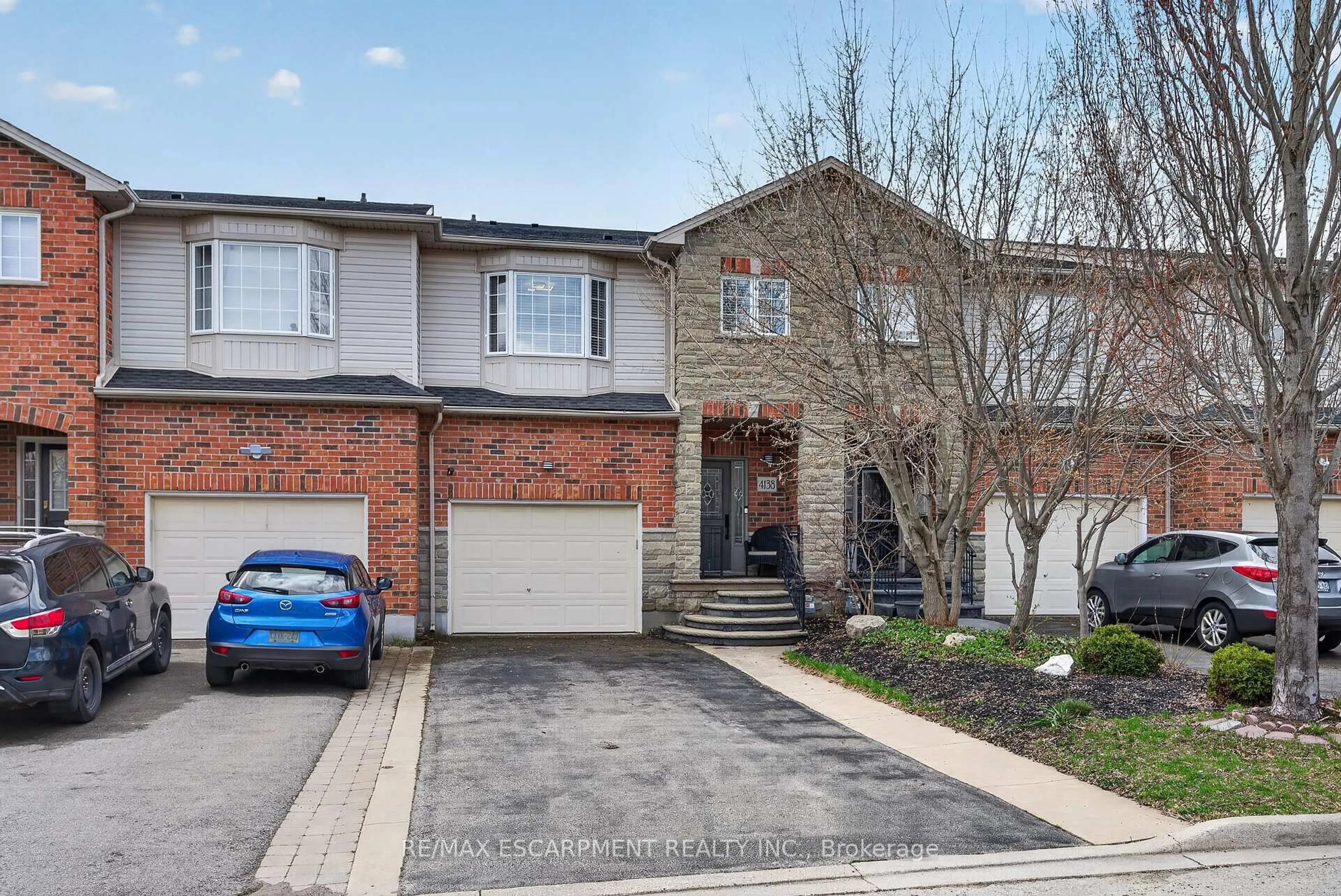Home with brick exterior material, street for 4138 Medland Dr, Burlington Ontario L7M 4Z8