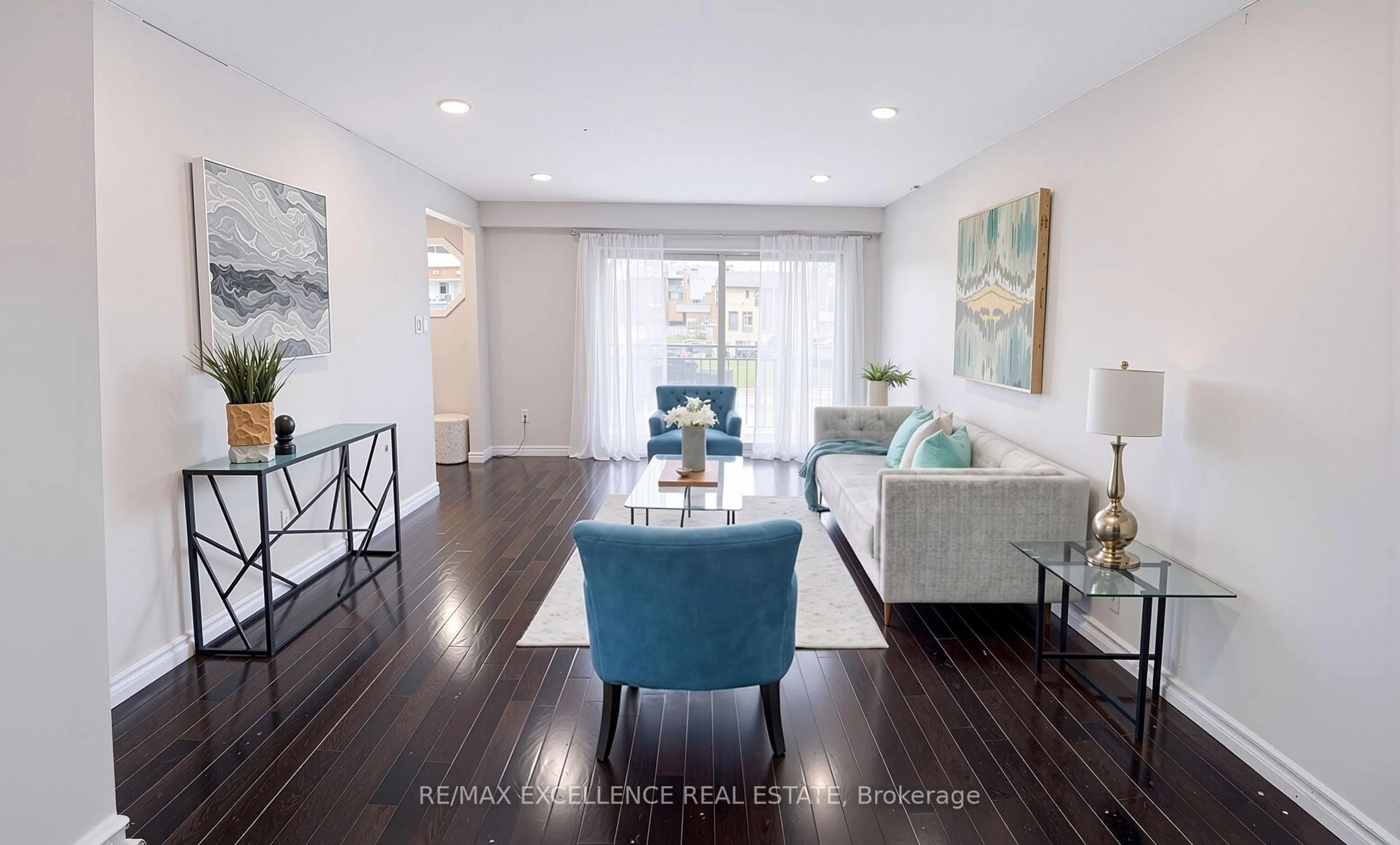 Living room with furniture, wood/laminate floor for 44 Fallway Rd, Brampton Ontario L6V 3H2