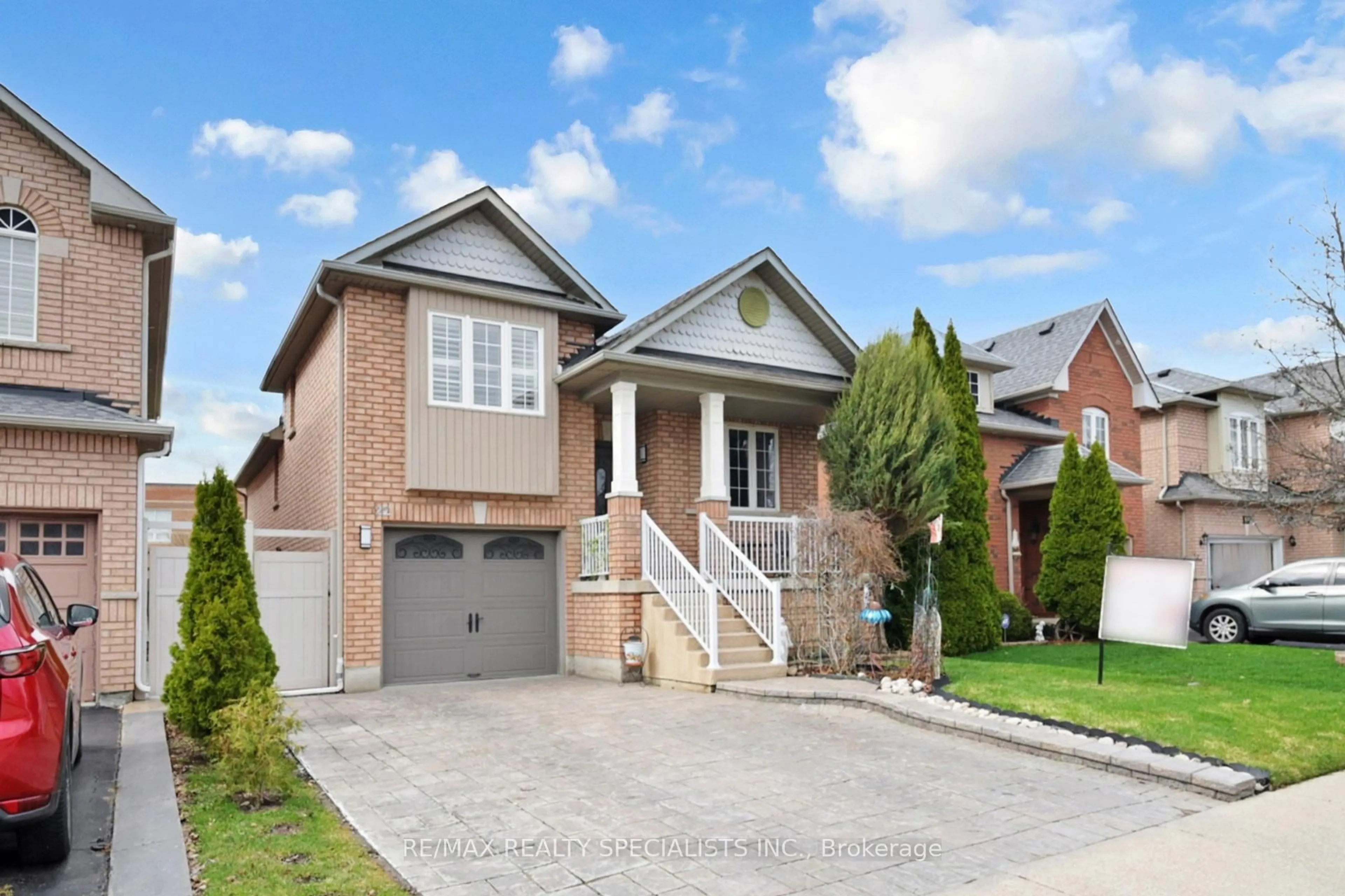 Home with brick exterior material, street for 22 Thimbleberry St, Brampton Ontario L7A 3L4