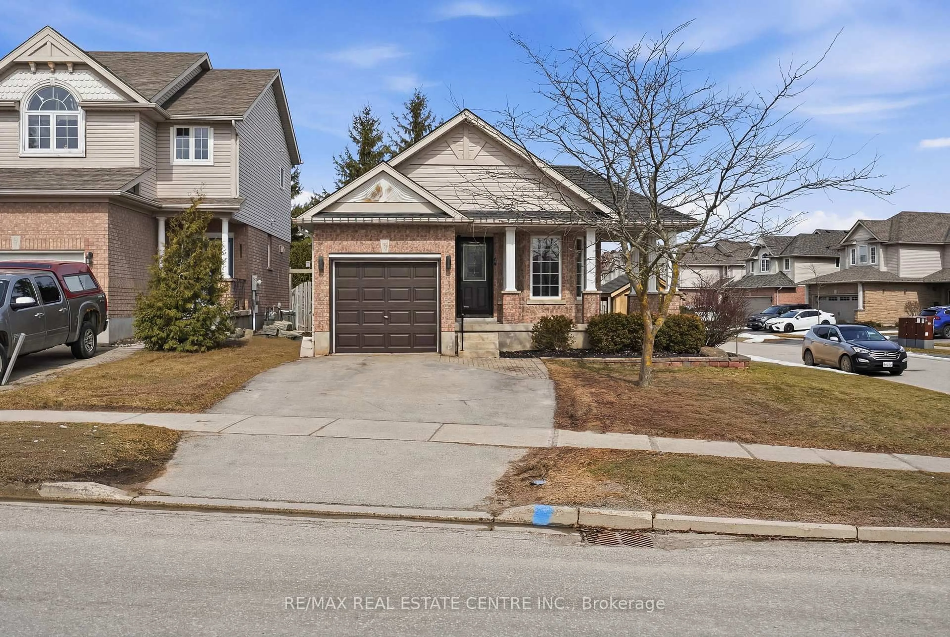 Home with brick exterior material, street for 321 Montgomery Blvd, Orangeville Ontario L9W 5G7