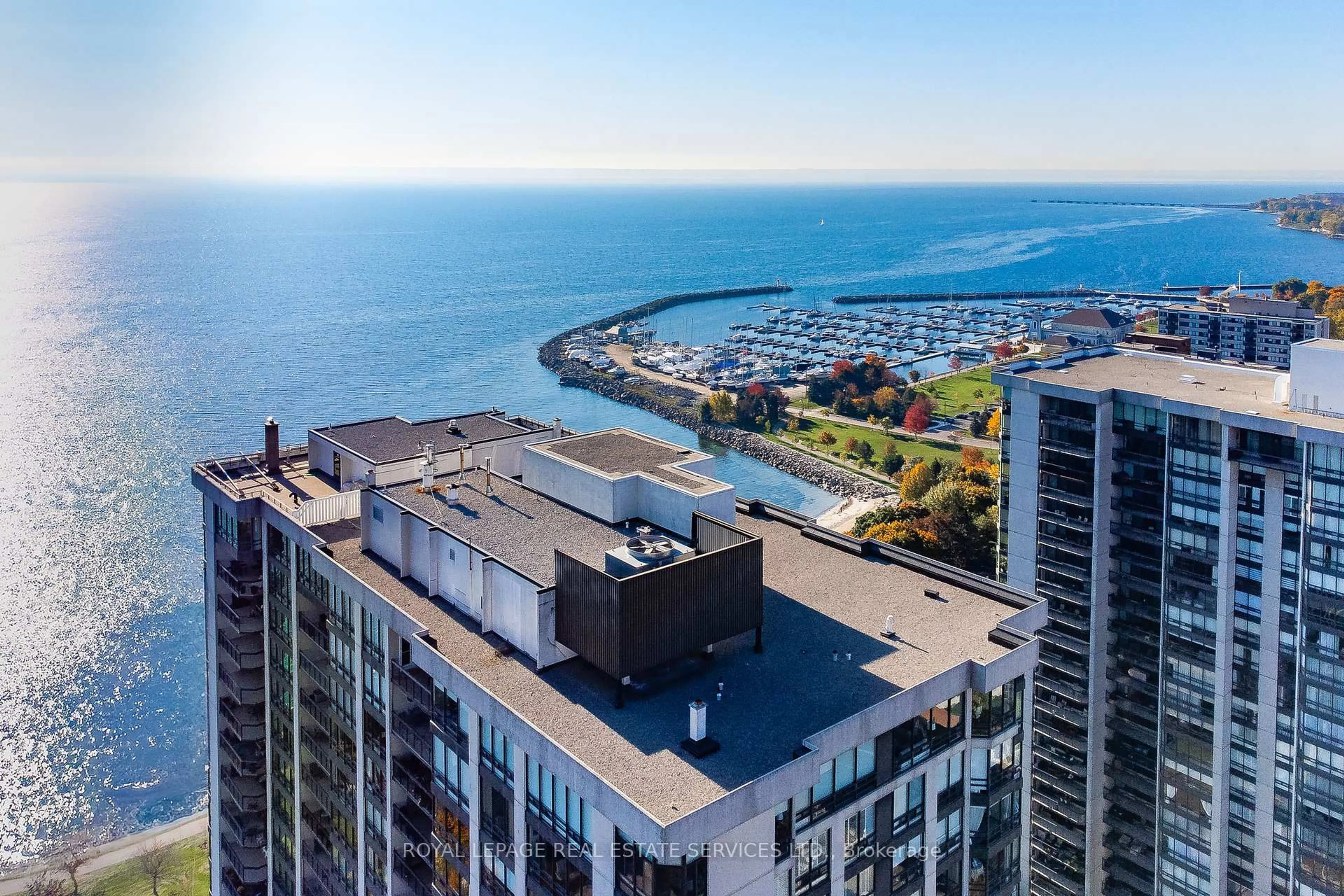 A pic from outside/outdoor area/front of a property/back of a property/a pic from drone, city buildings view from balcony for 2170 Marine Dr #403, Oakville Ontario L6L 5V1
