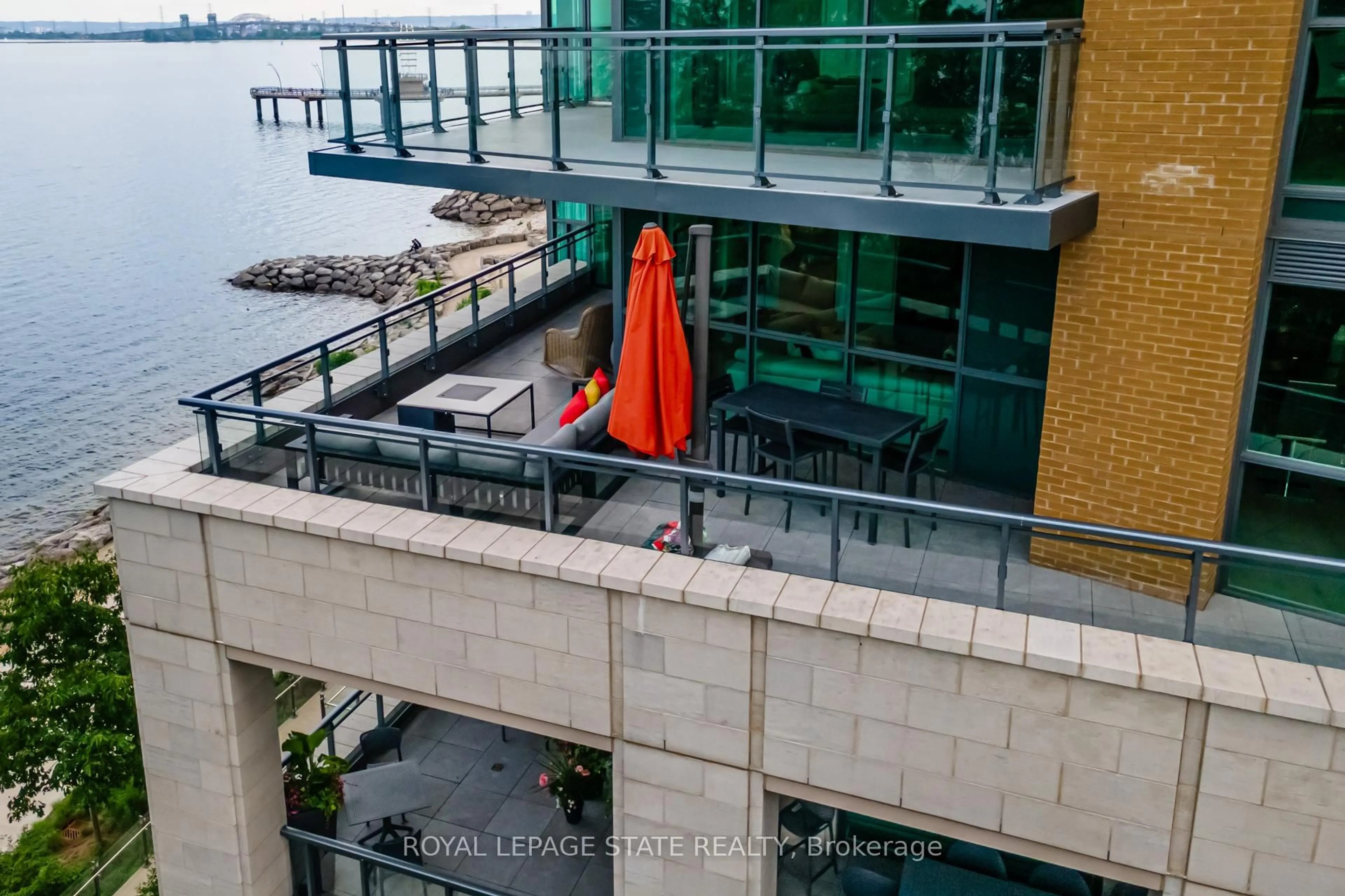 A pic from outside/outdoor area/front of a property/back of a property/a pic from drone, city buildings view from balcony for 2060 Lakeshore Rd #308, Burlington Ontario L7R 0G2