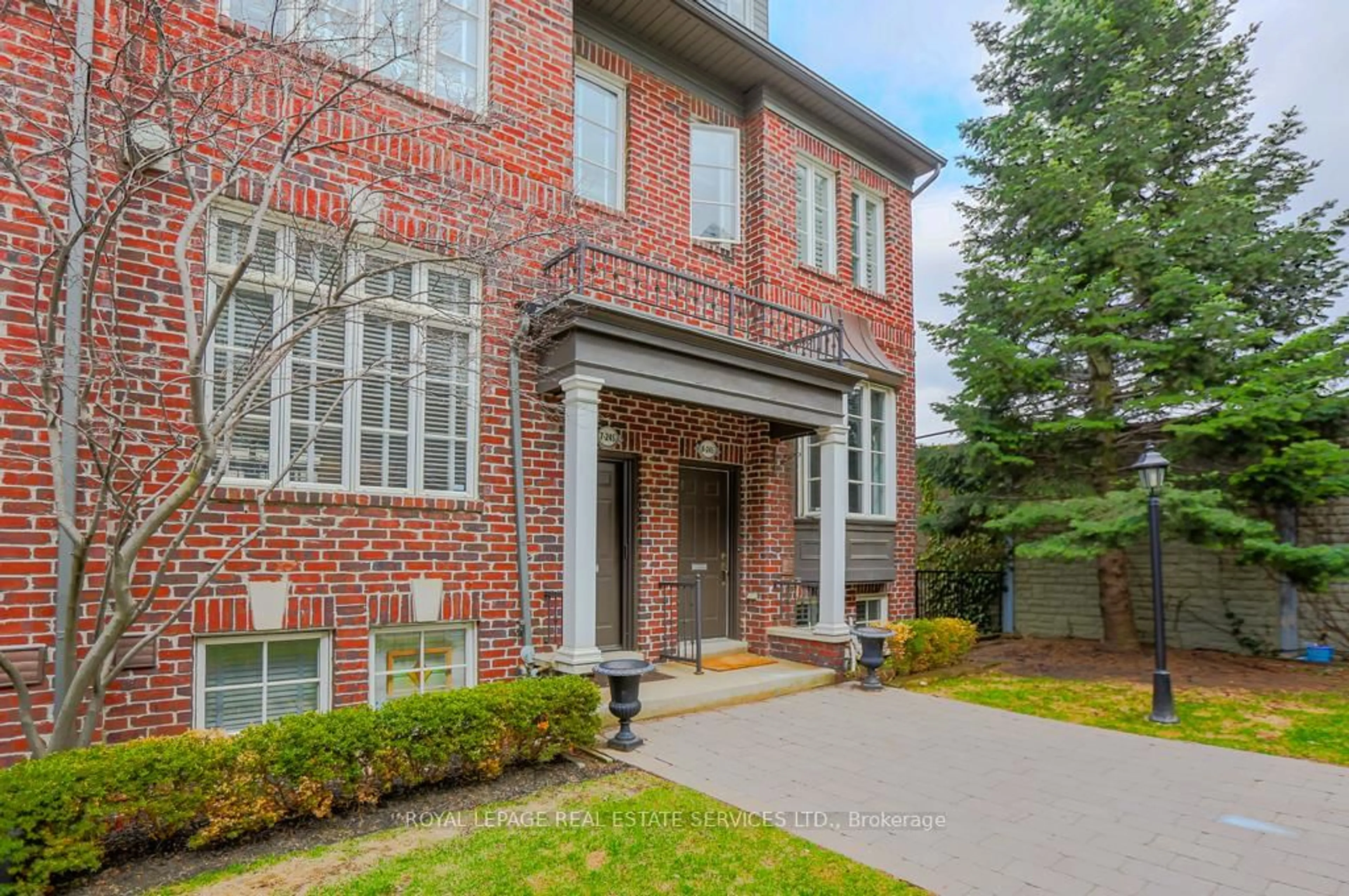 Home with brick exterior material, street for 245 Van Dusen Blvd ##8, Toronto Ontario M8Z 3J2