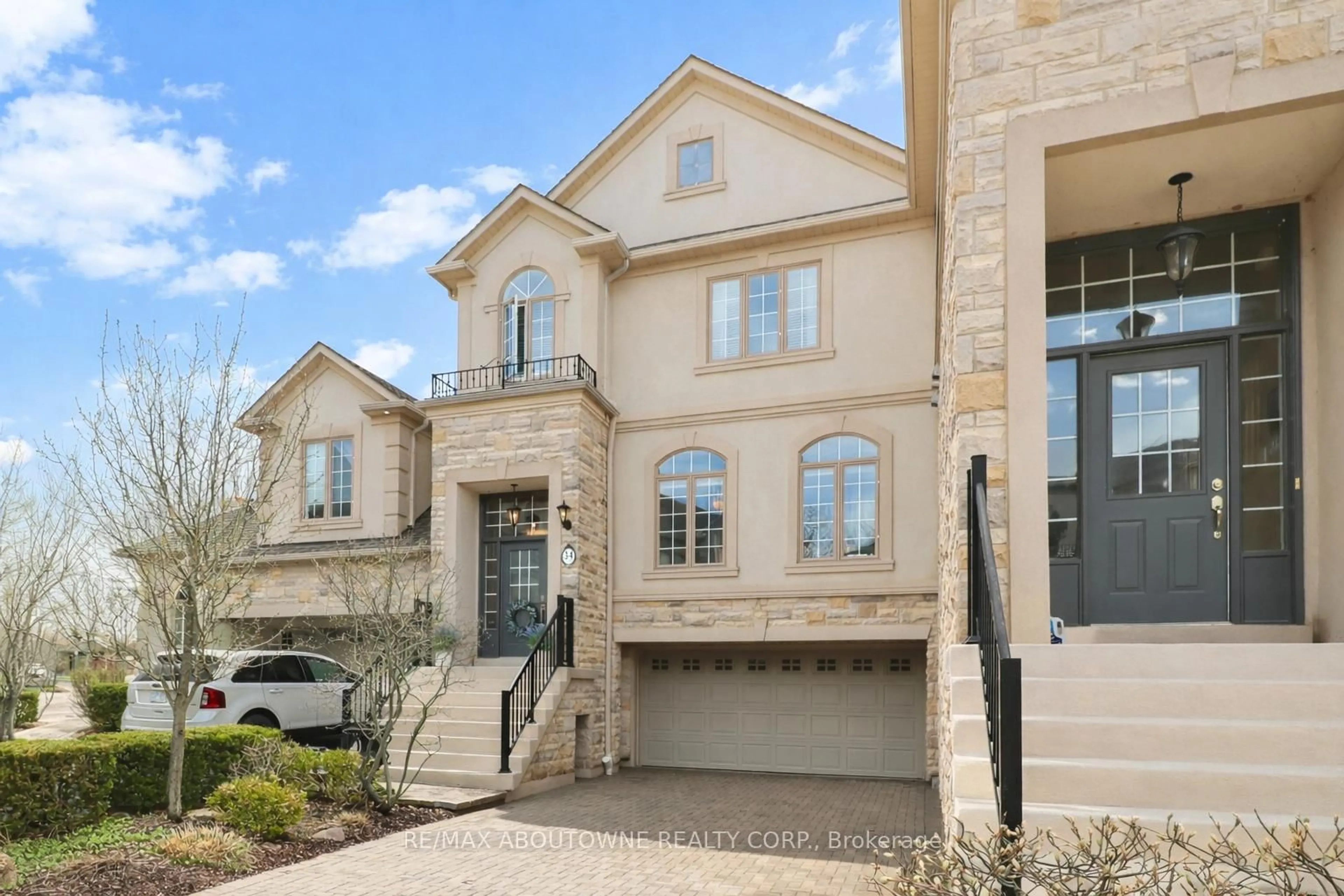 Home with brick exterior material, street for 2400 Neyagawa Blvd #34, Oakville Ontario L6H 7P5