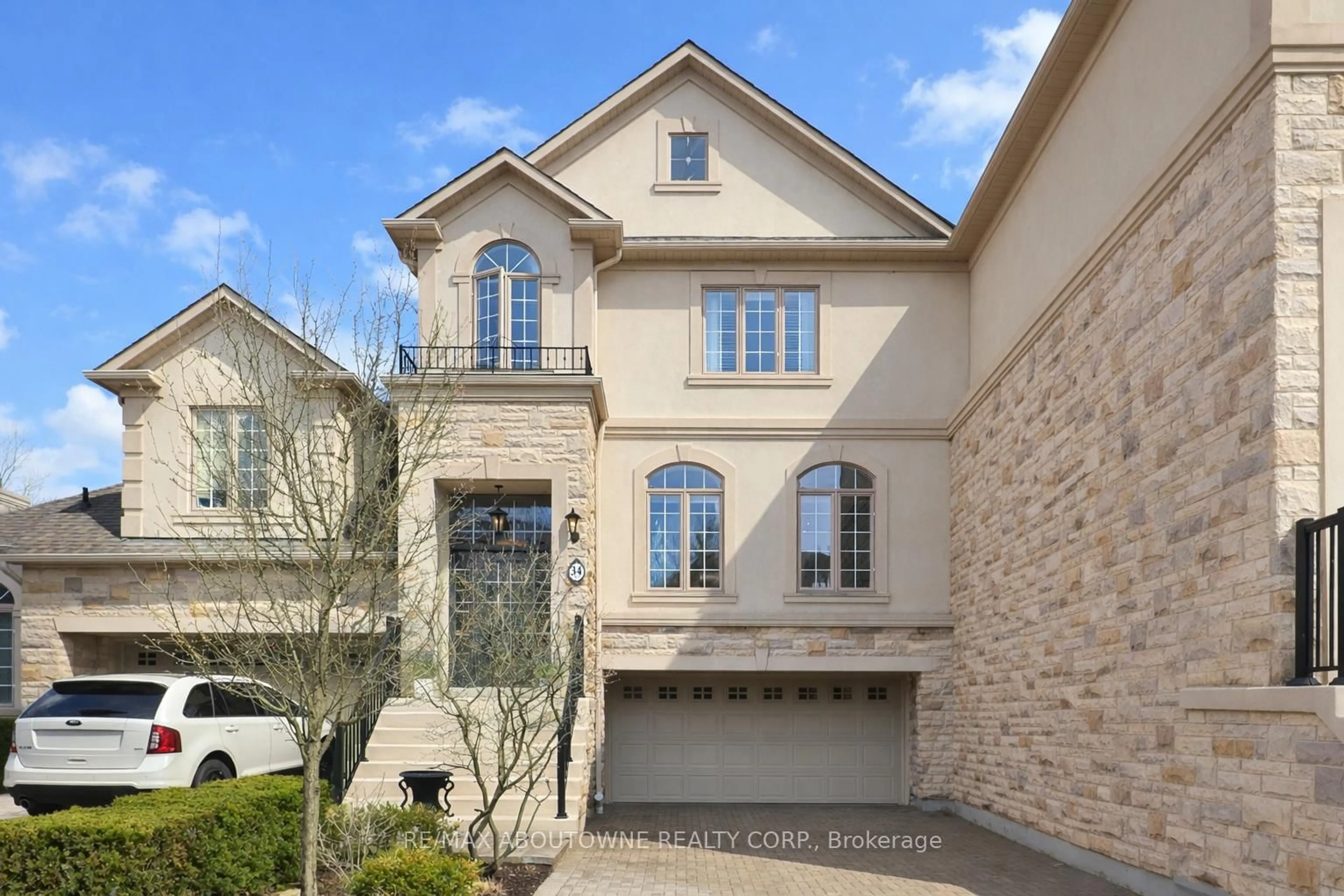 Home with brick exterior material, street for 2400 Neyagawa Blvd #34, Oakville Ontario L6H 7P5