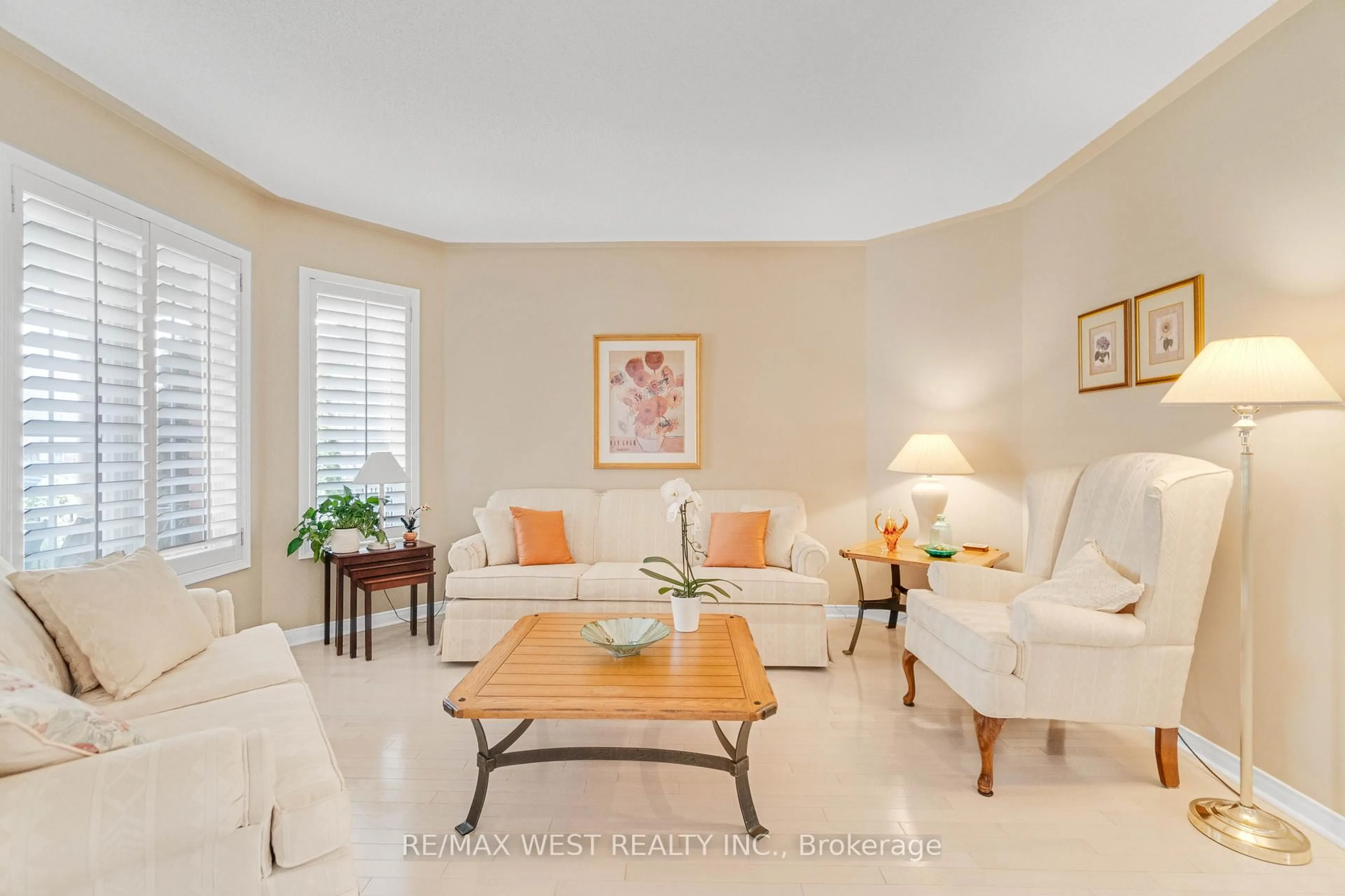 Living room with furniture, ceramic/tile floor for 44 Creekwood Dr, Brampton Ontario L7A 1J3