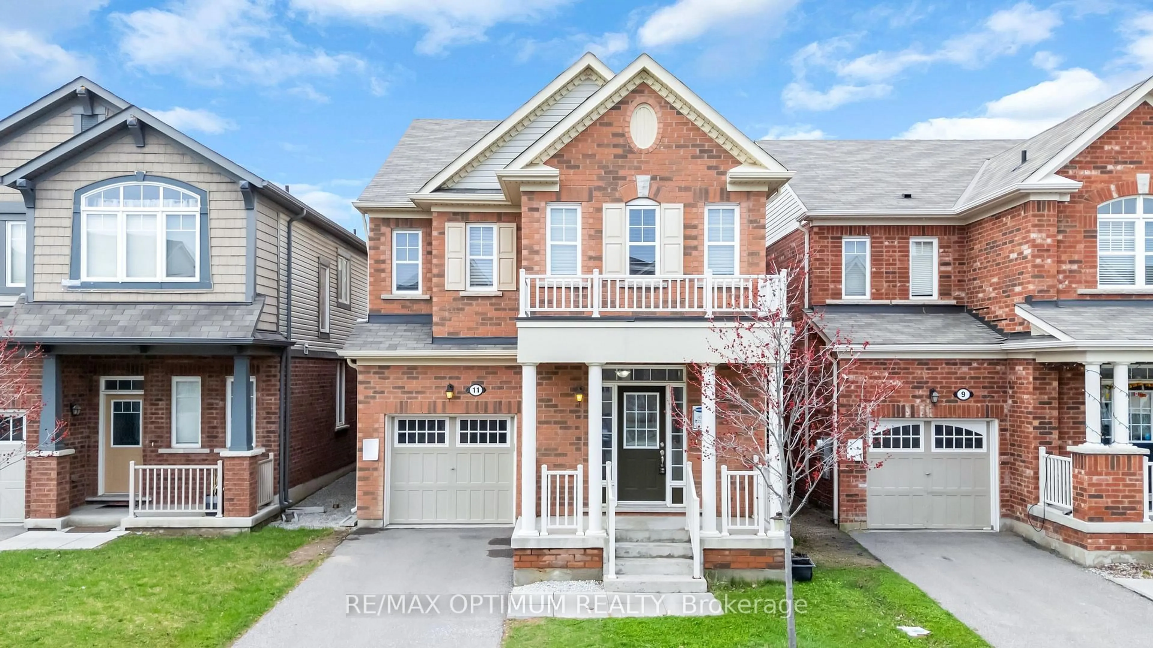 Home with brick exterior material, street for 11 Emerald Coast Tr, Brampton Ontario L7A 5A7